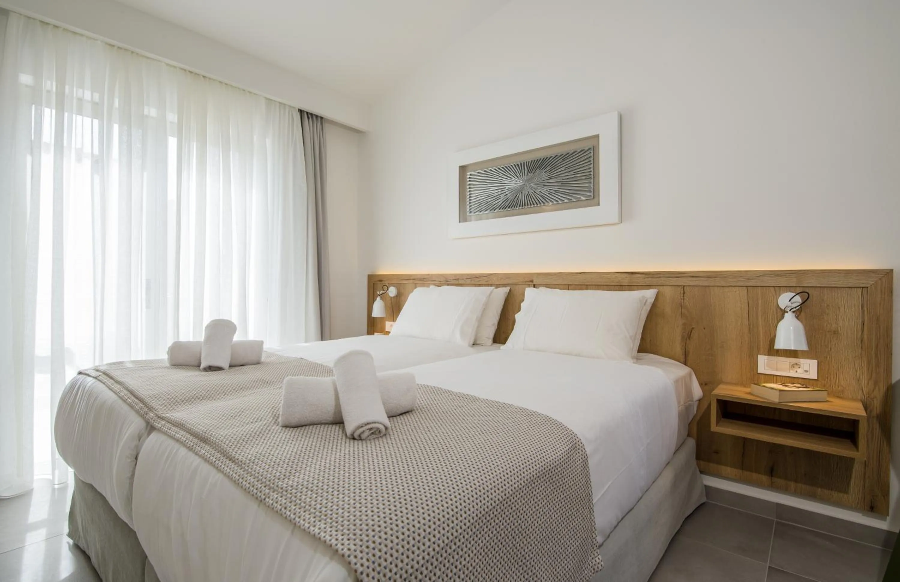 Bed in Lotus Hotel Apartments