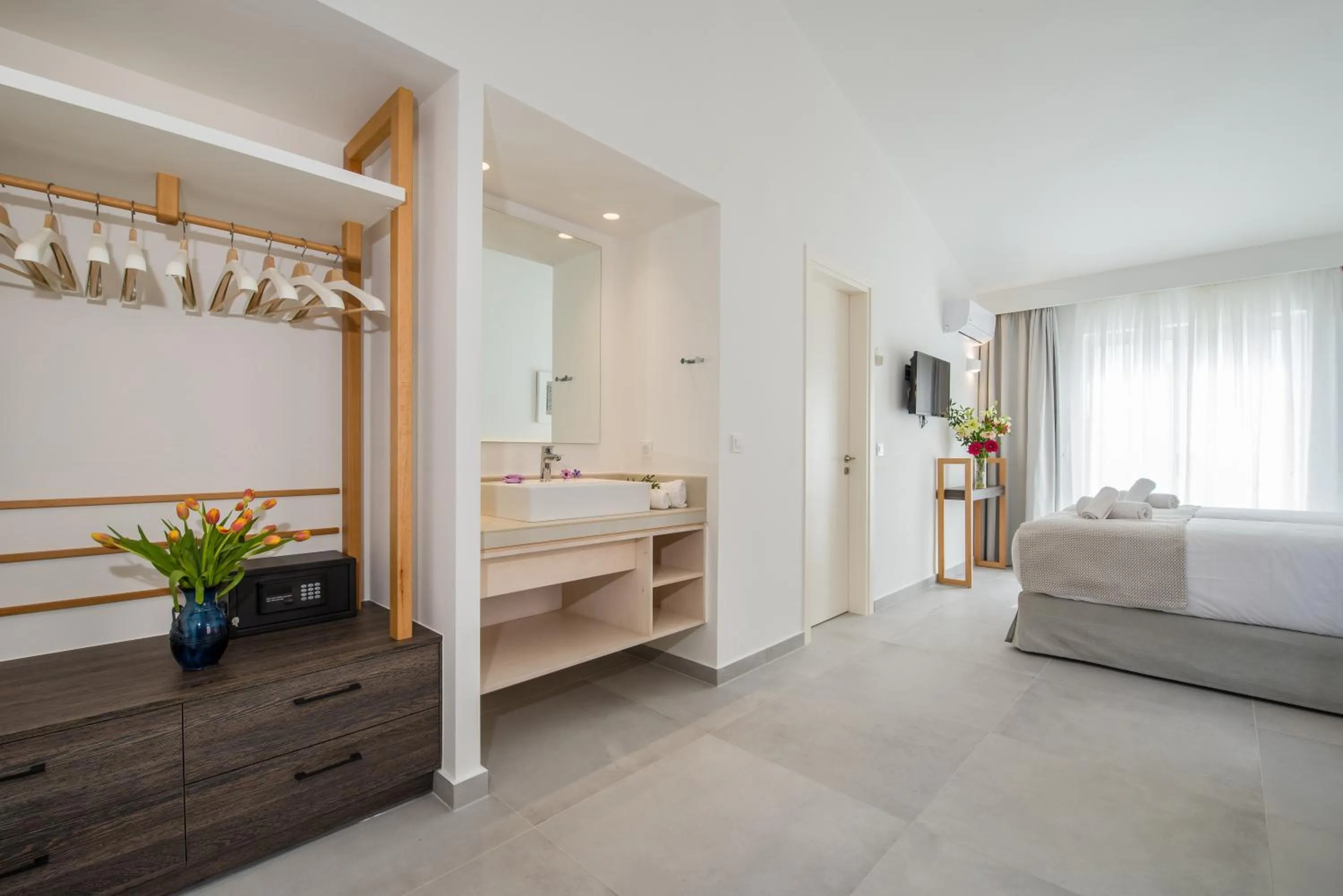 Bed in Lotus Hotel Apartments