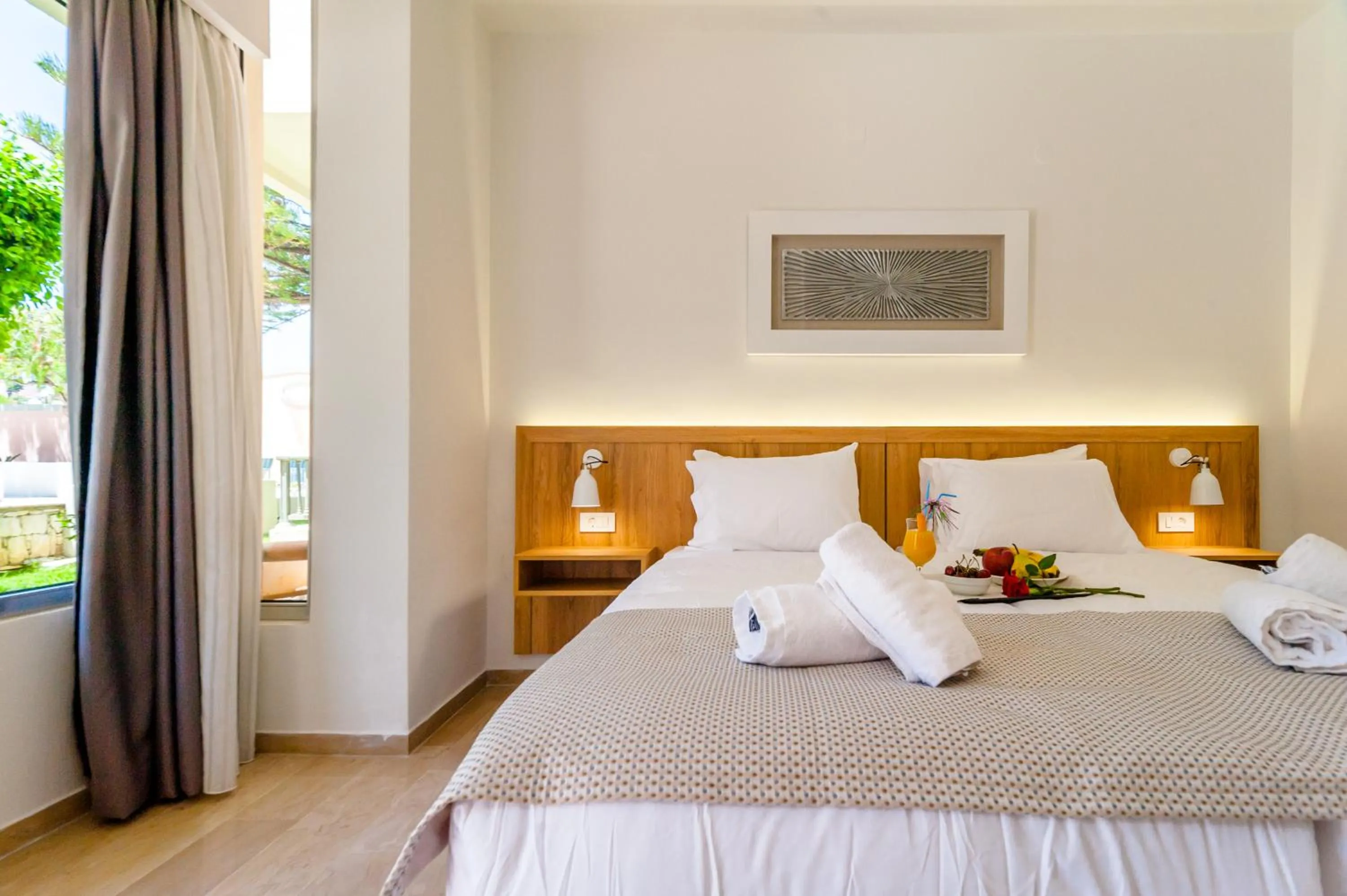 Bed in Lotus Hotel Apartments