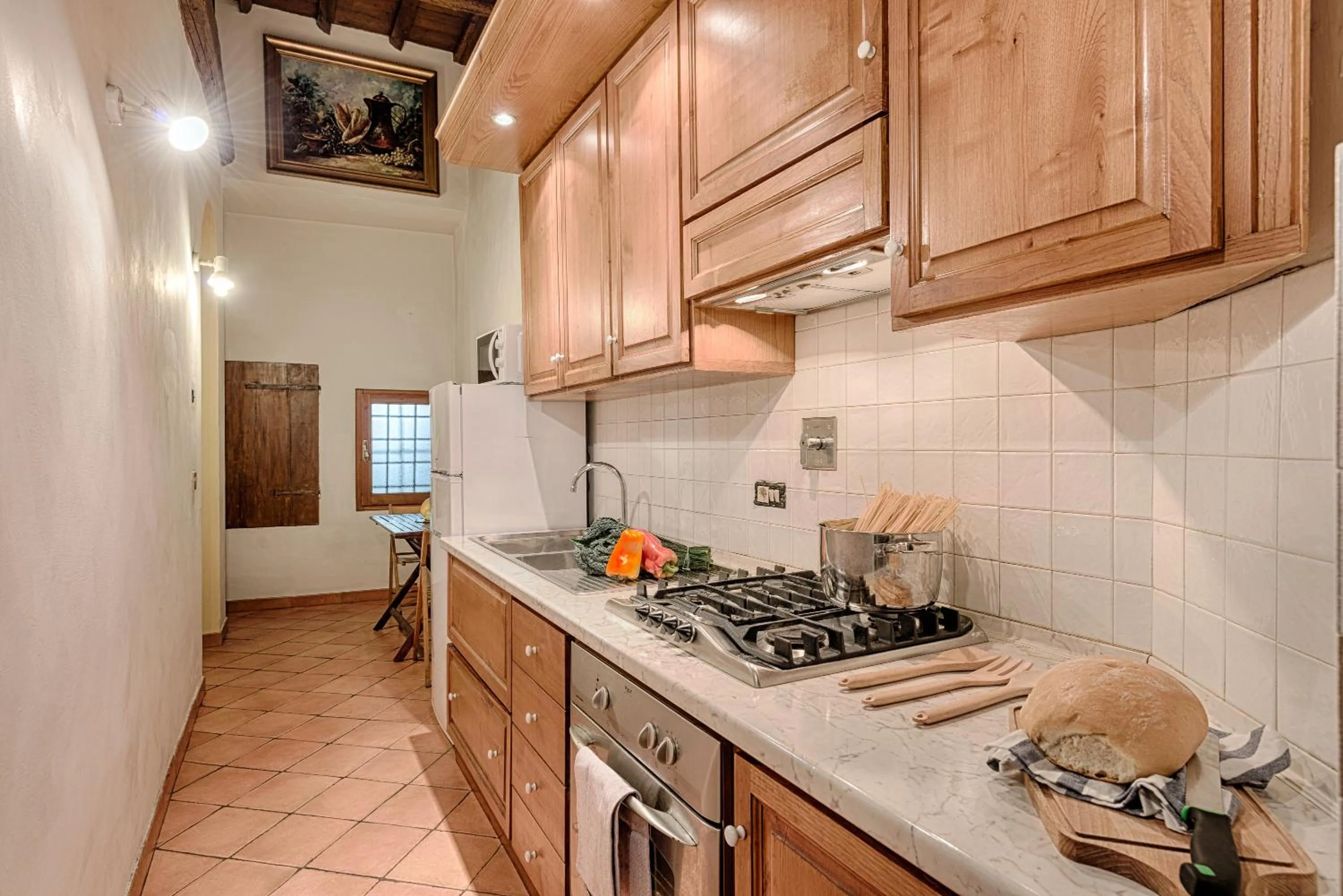 Kitchen or kitchenette in Central Strozzi by Mmega