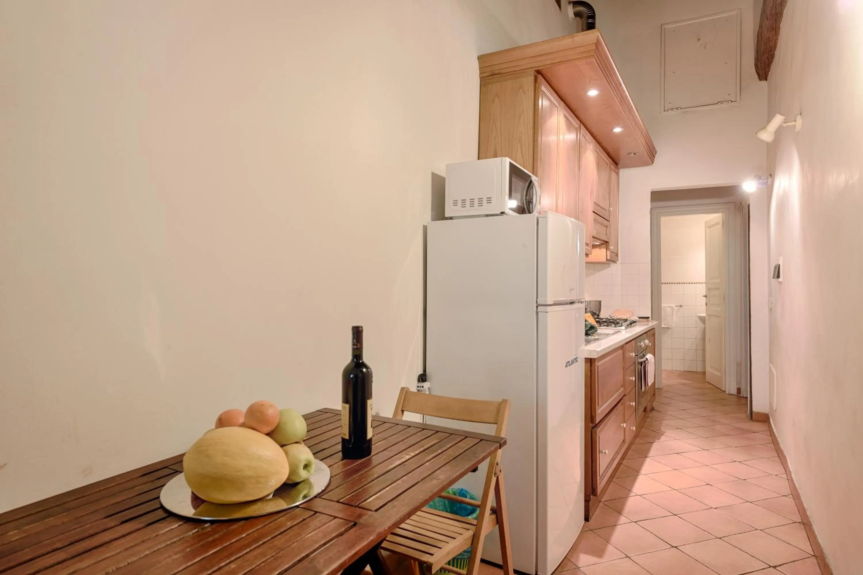 Kitchen or kitchenette in Central Strozzi by Mmega
