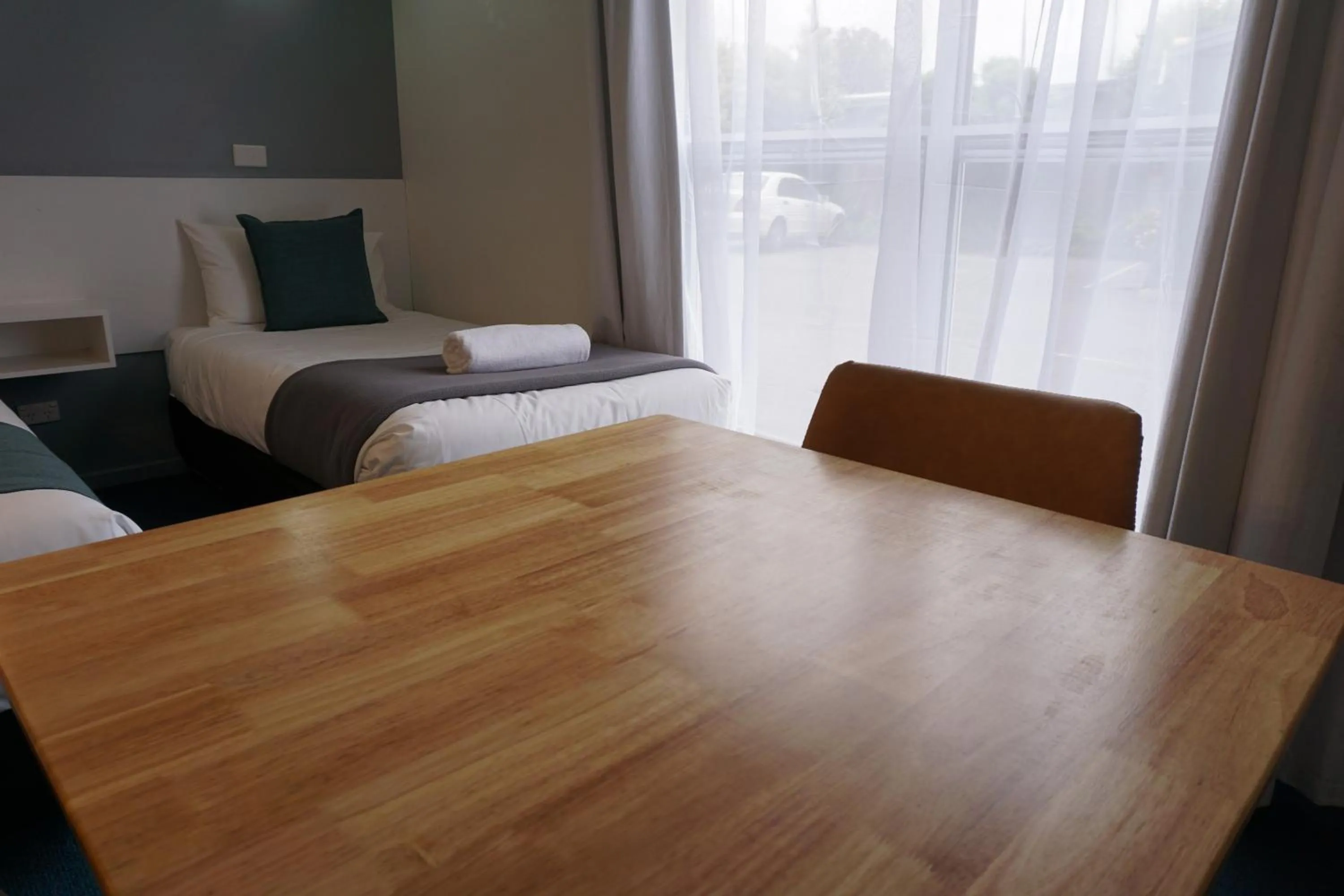 View (from property/room), Bed in Central Motel Port Fairy