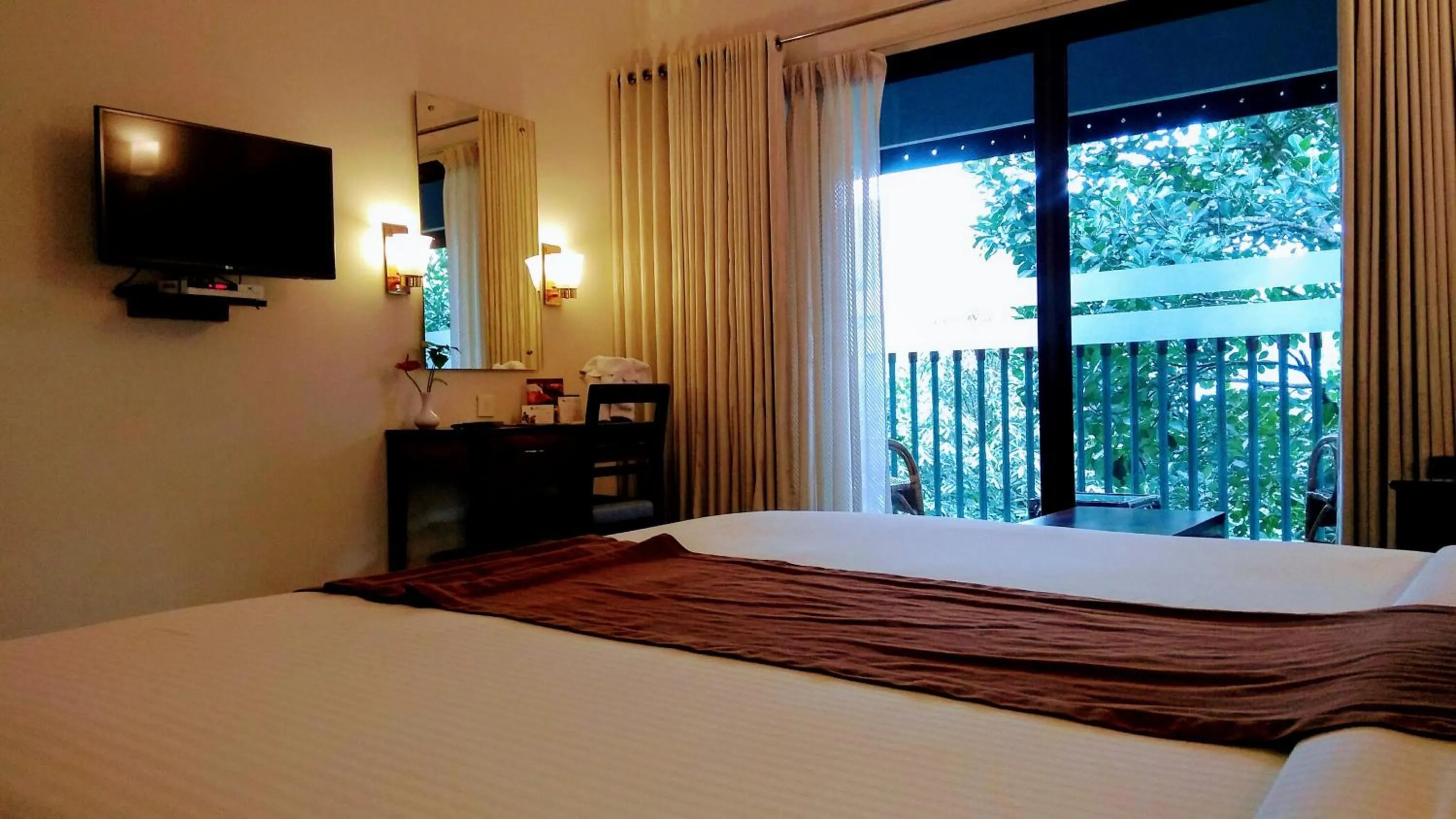 Bed in Abad Green Forest Thekkady