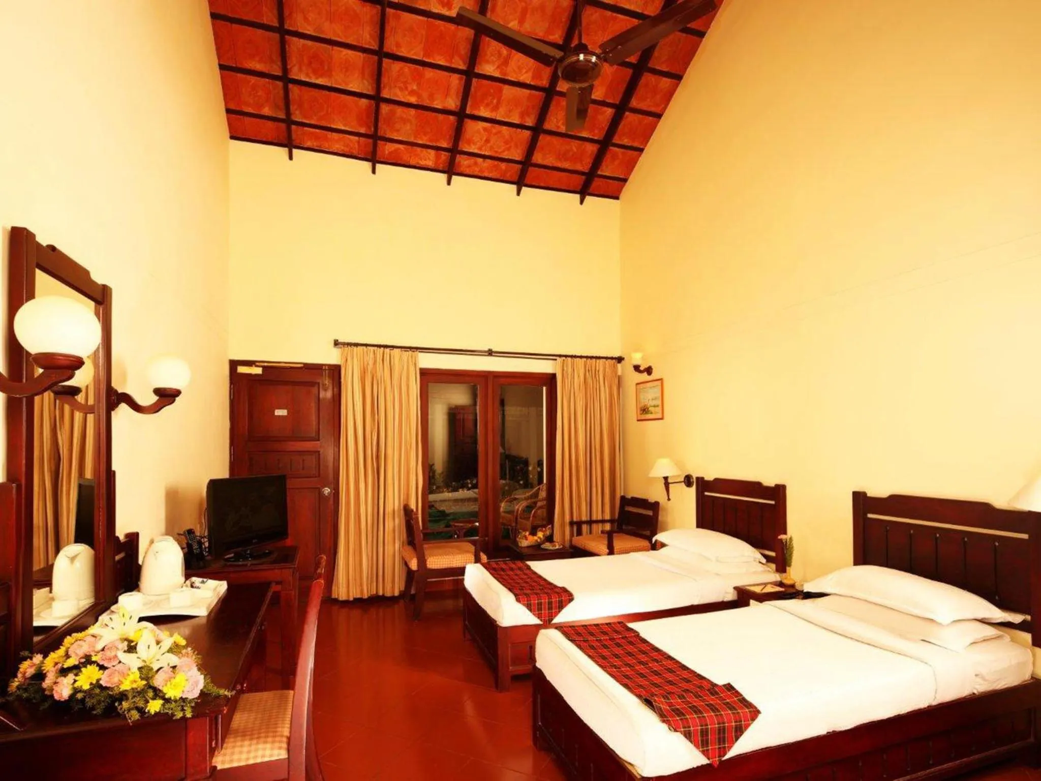 Photo of the whole room, Bed in Abad Whispering Palms