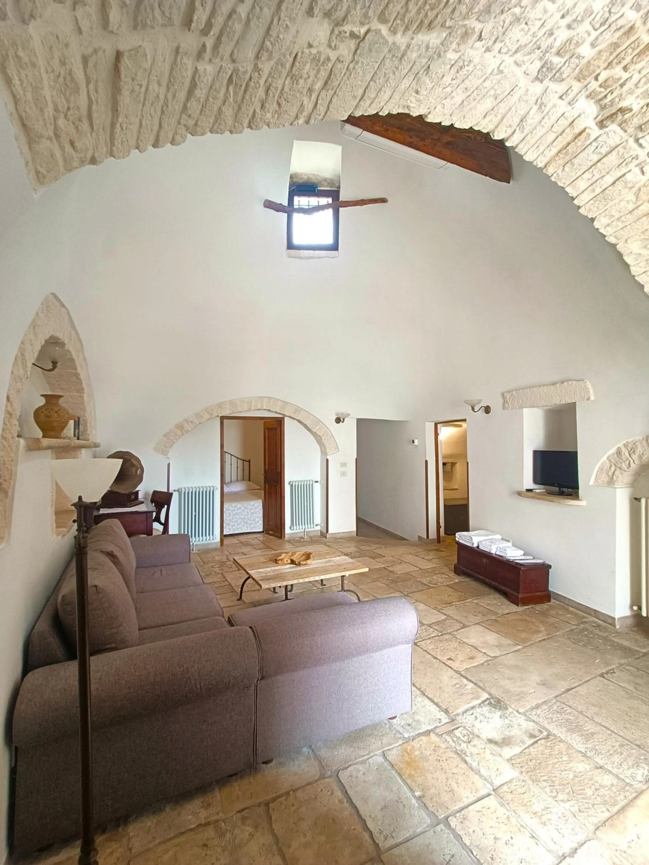 Living room, Bed in Trulli Soave