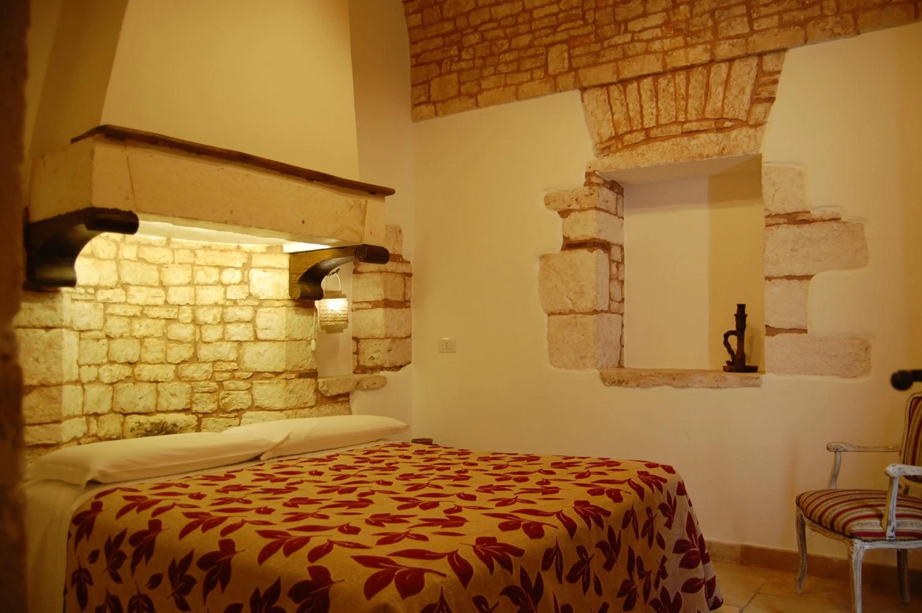 Photo of the whole room, Bed in Trulli Soave
