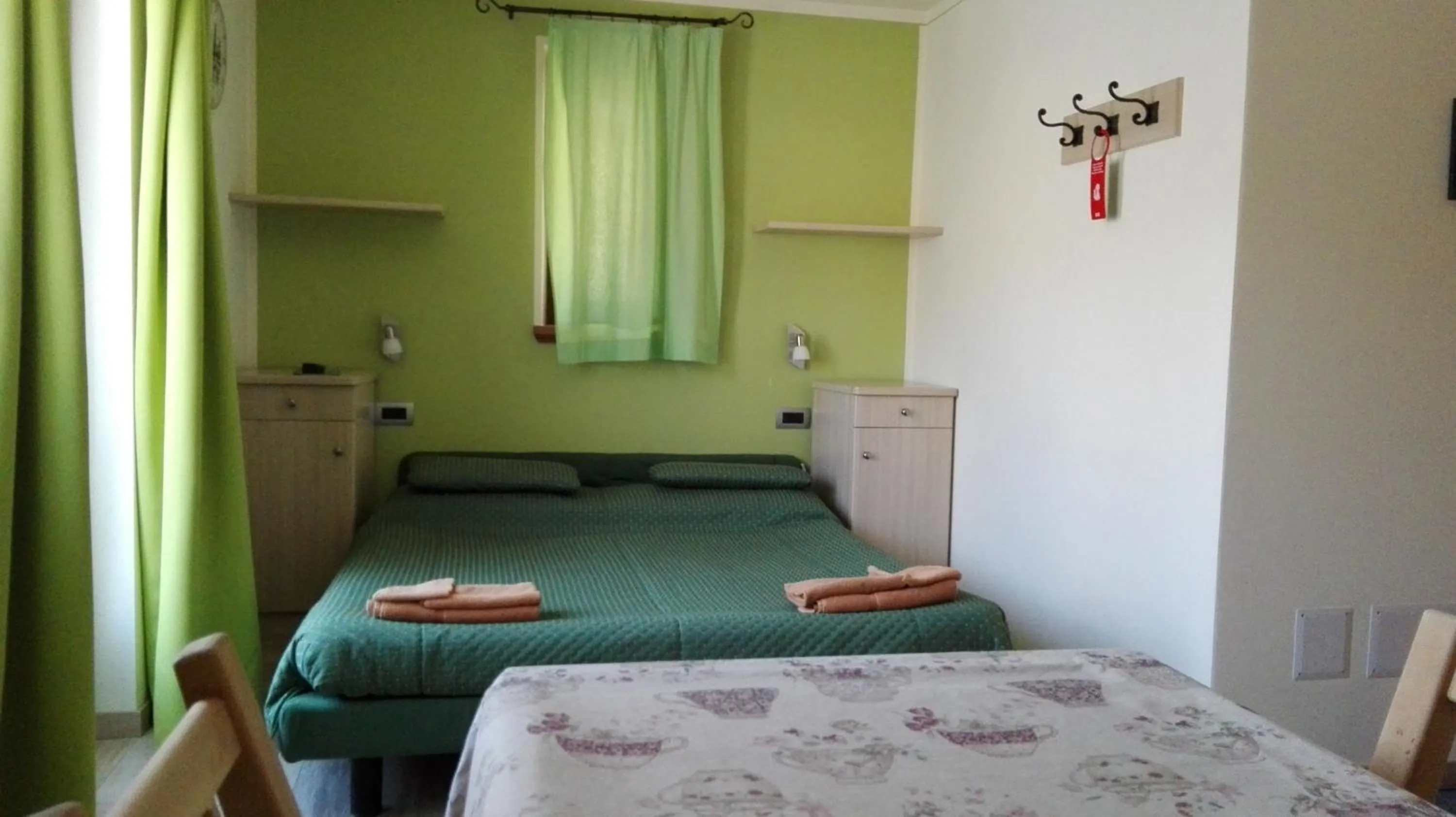 Living room, Bed in Garni Delia