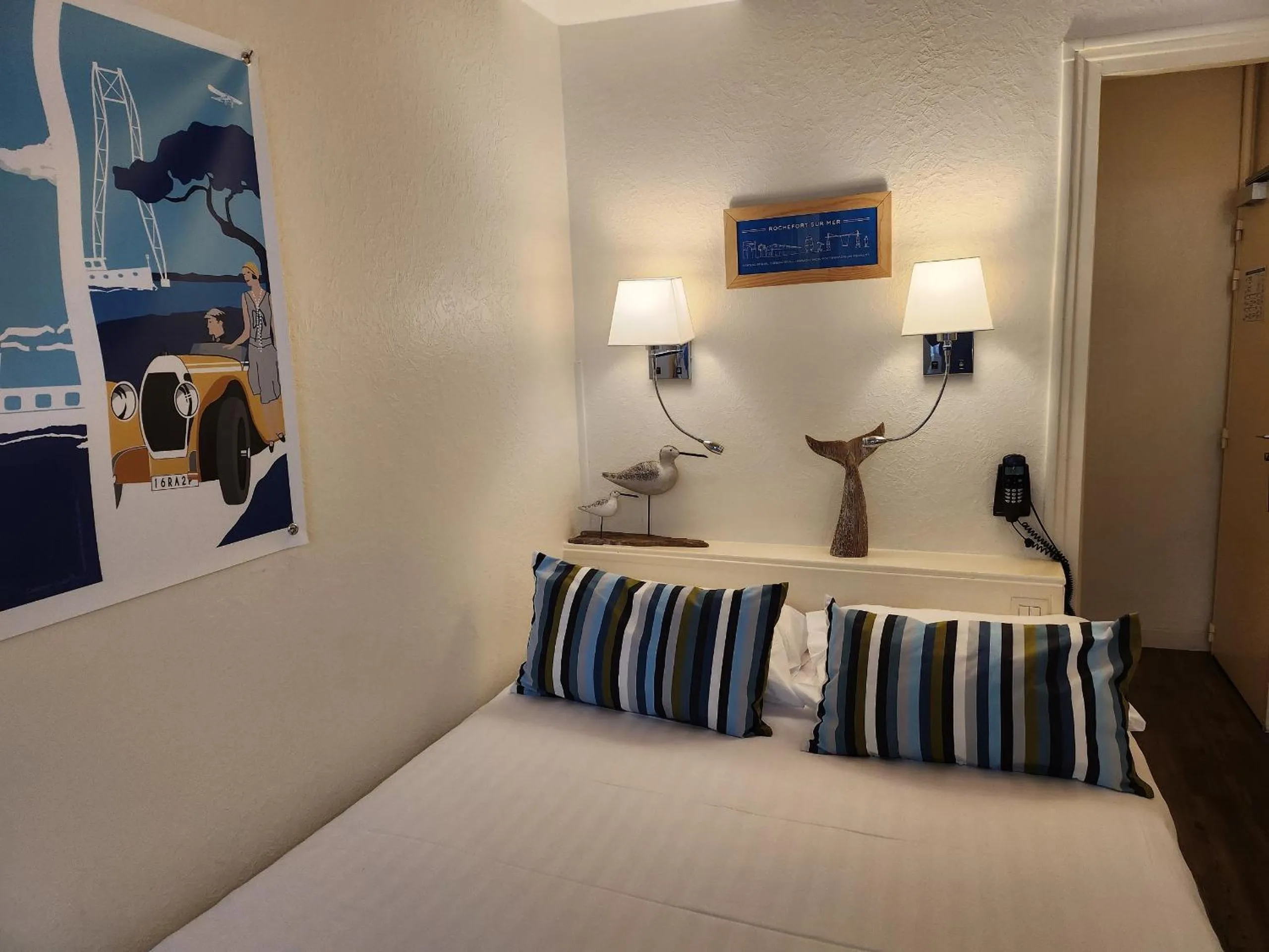 Bed in Logis Hôtel Lafayette Rochefort France