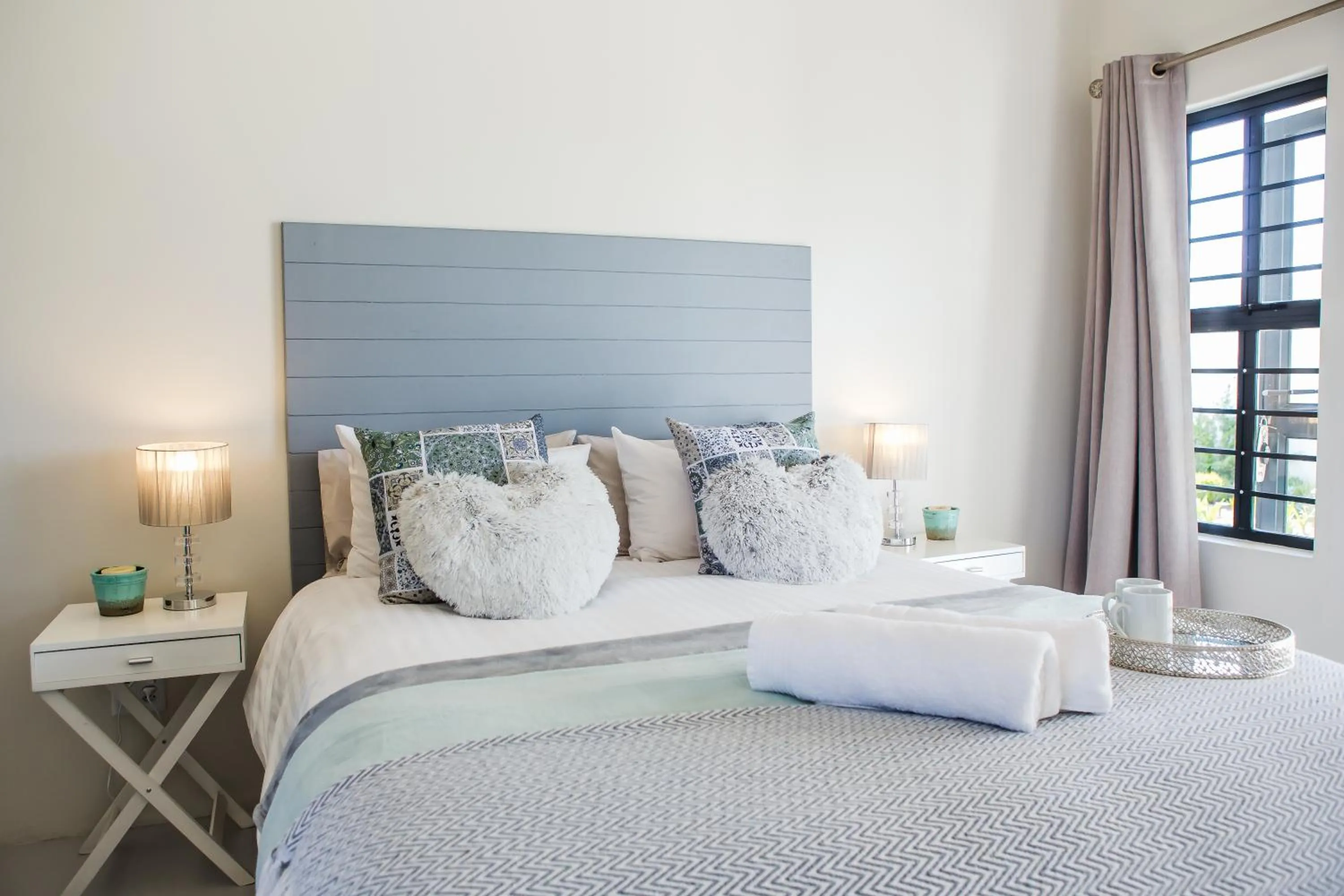 Bed in Three Feathers Cottages