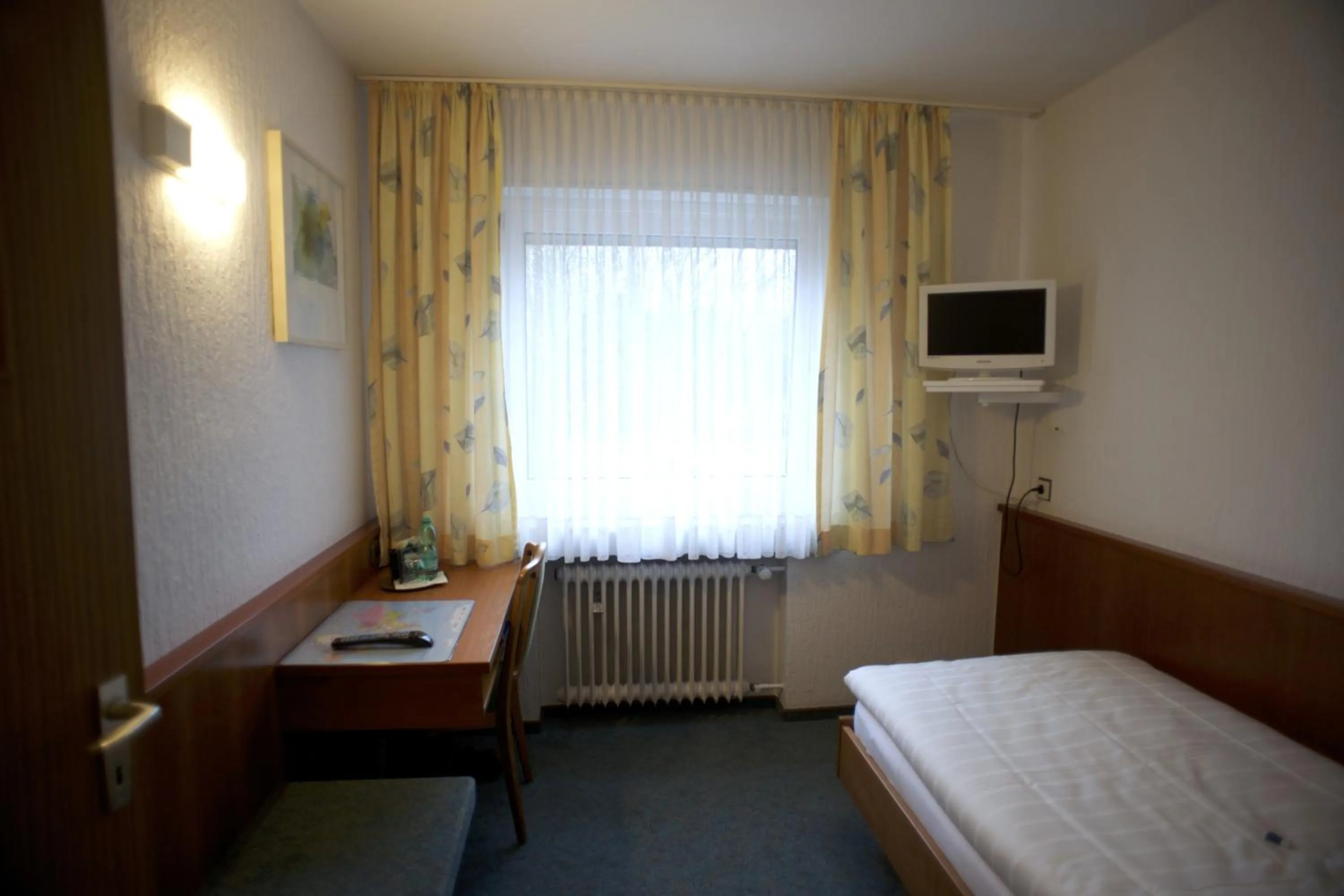 Photo of the whole room, Bed in Hotel Marienhof Düsseldorf Neuss