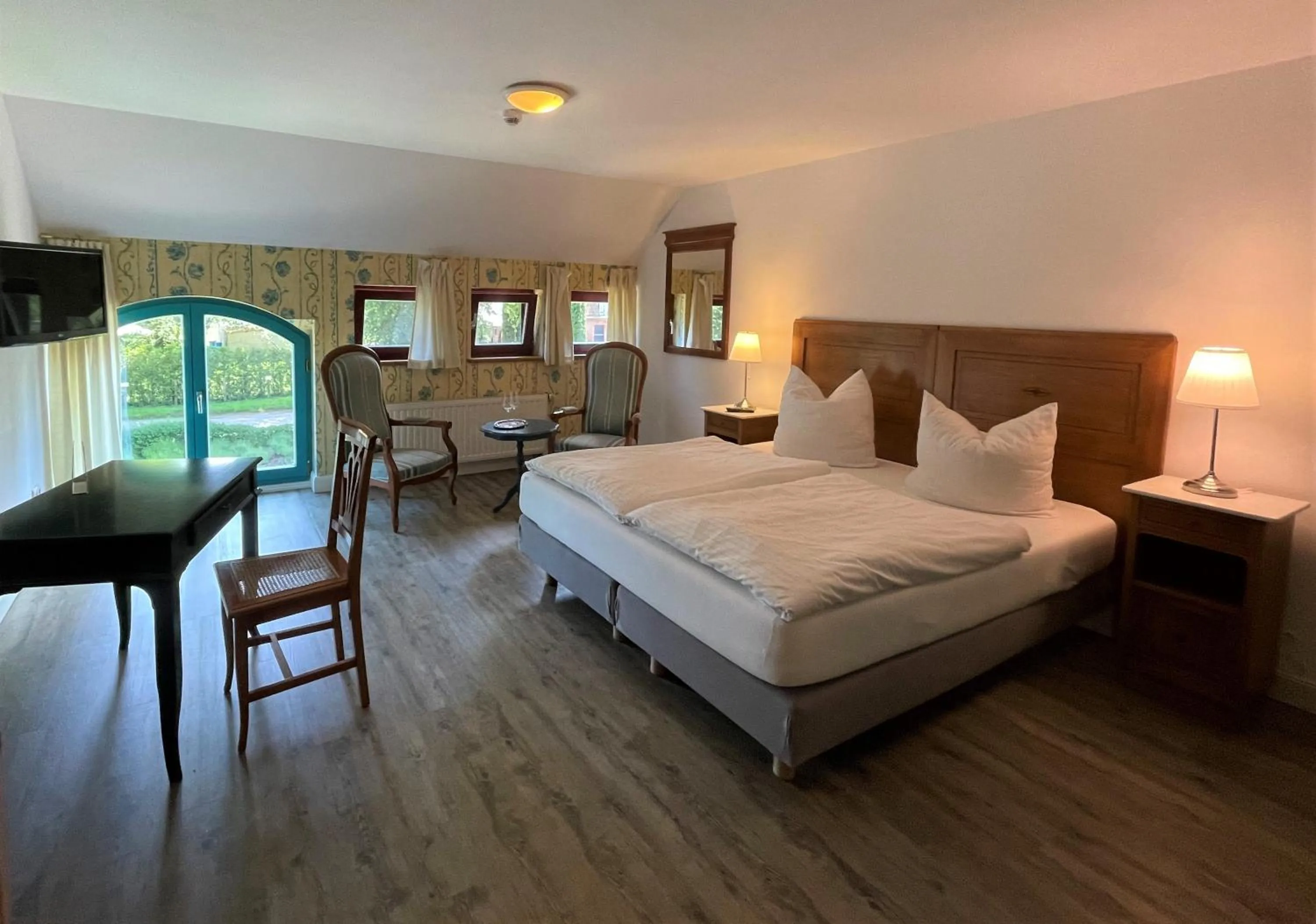 Photo of the whole room, Bed in Hotel Wasserschloss Mellenthin