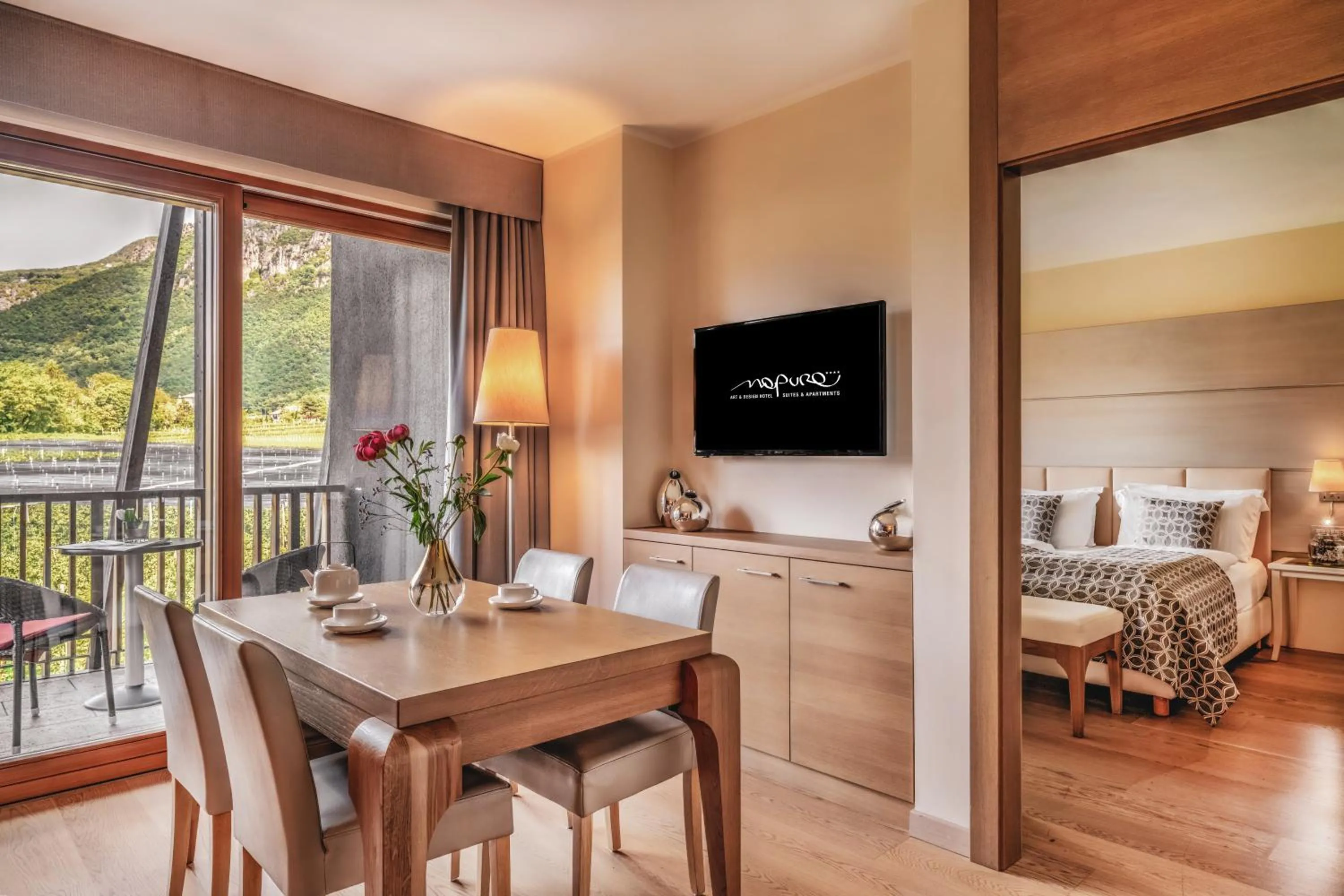 Communal lounge/ TV room, Bed in Art & Design Hotel Napura