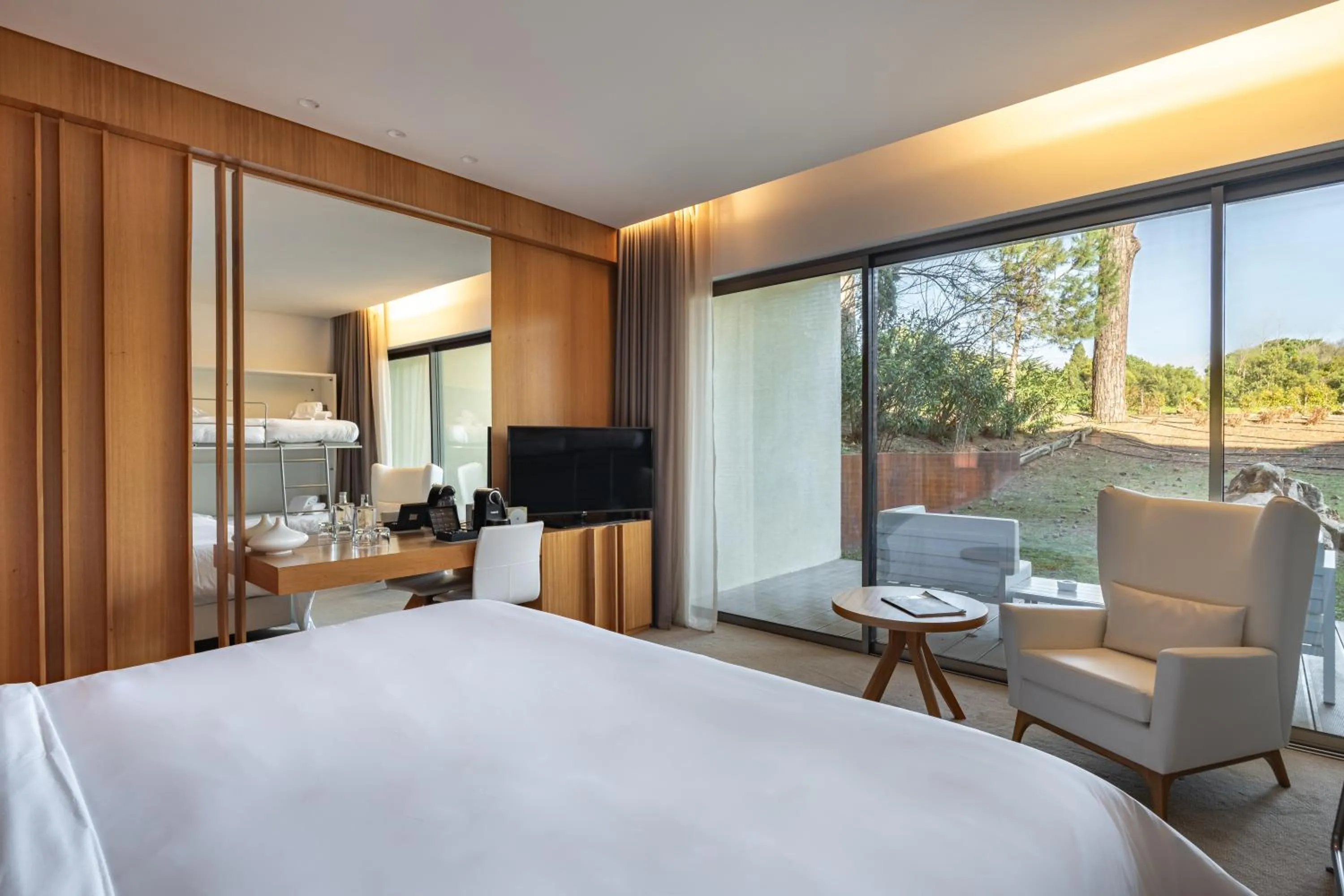 Communal lounge/ TV room, Bed in Onyria Marinha Cascais, Vignette Collection by IHG