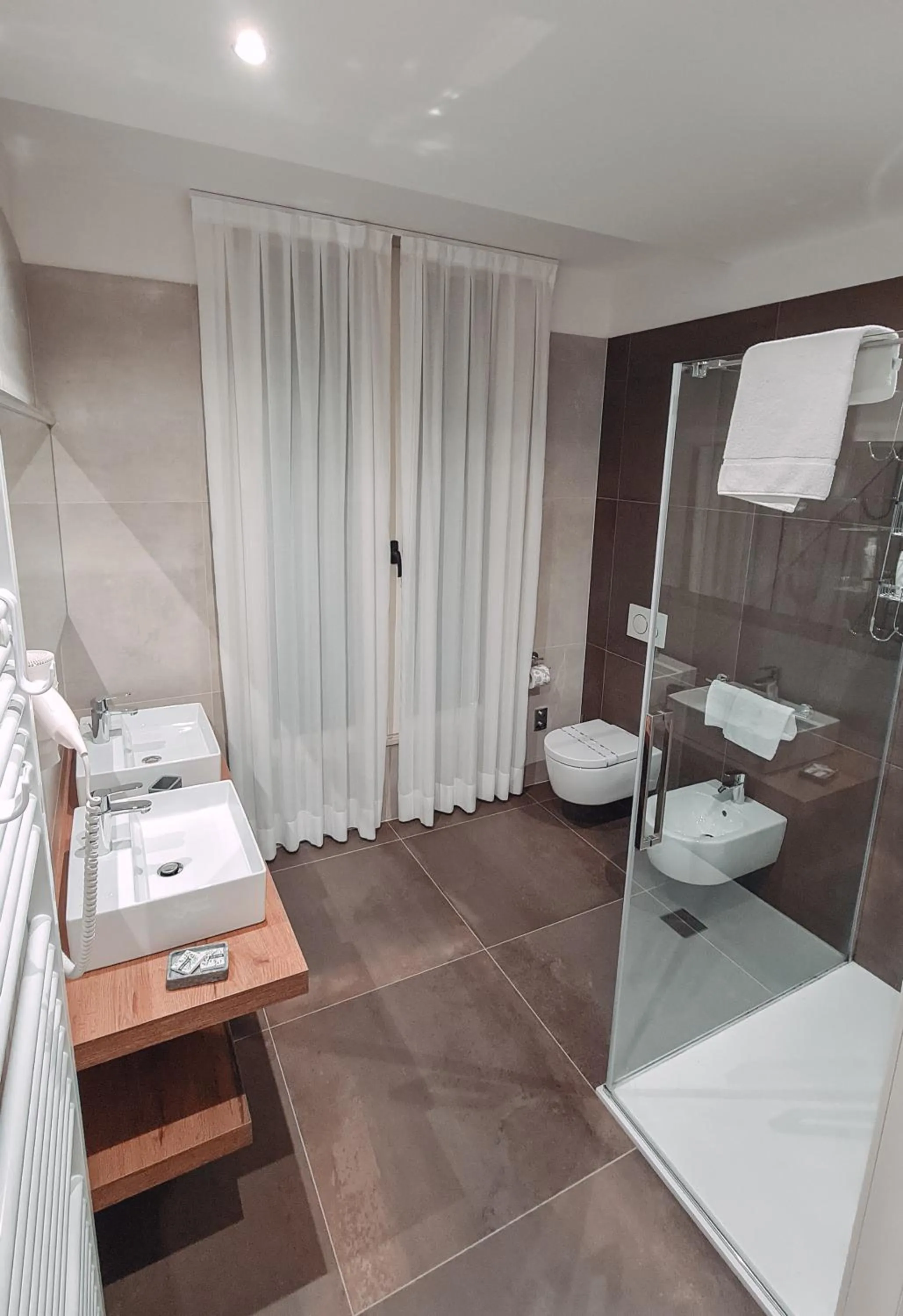 Toilet in Bertoletta Village Apartments