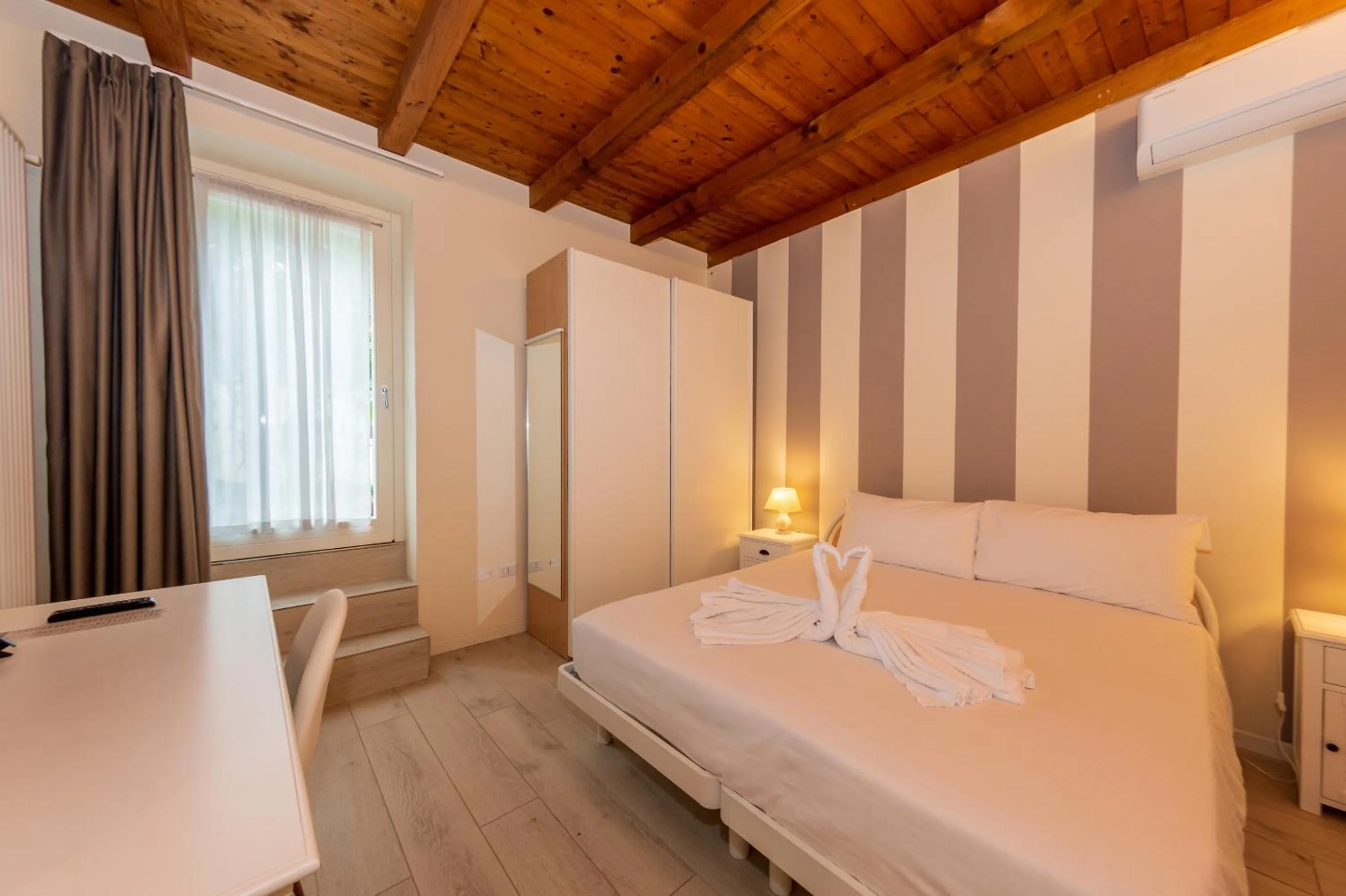 Bedroom, Bed in Bertoletta Village Apartments