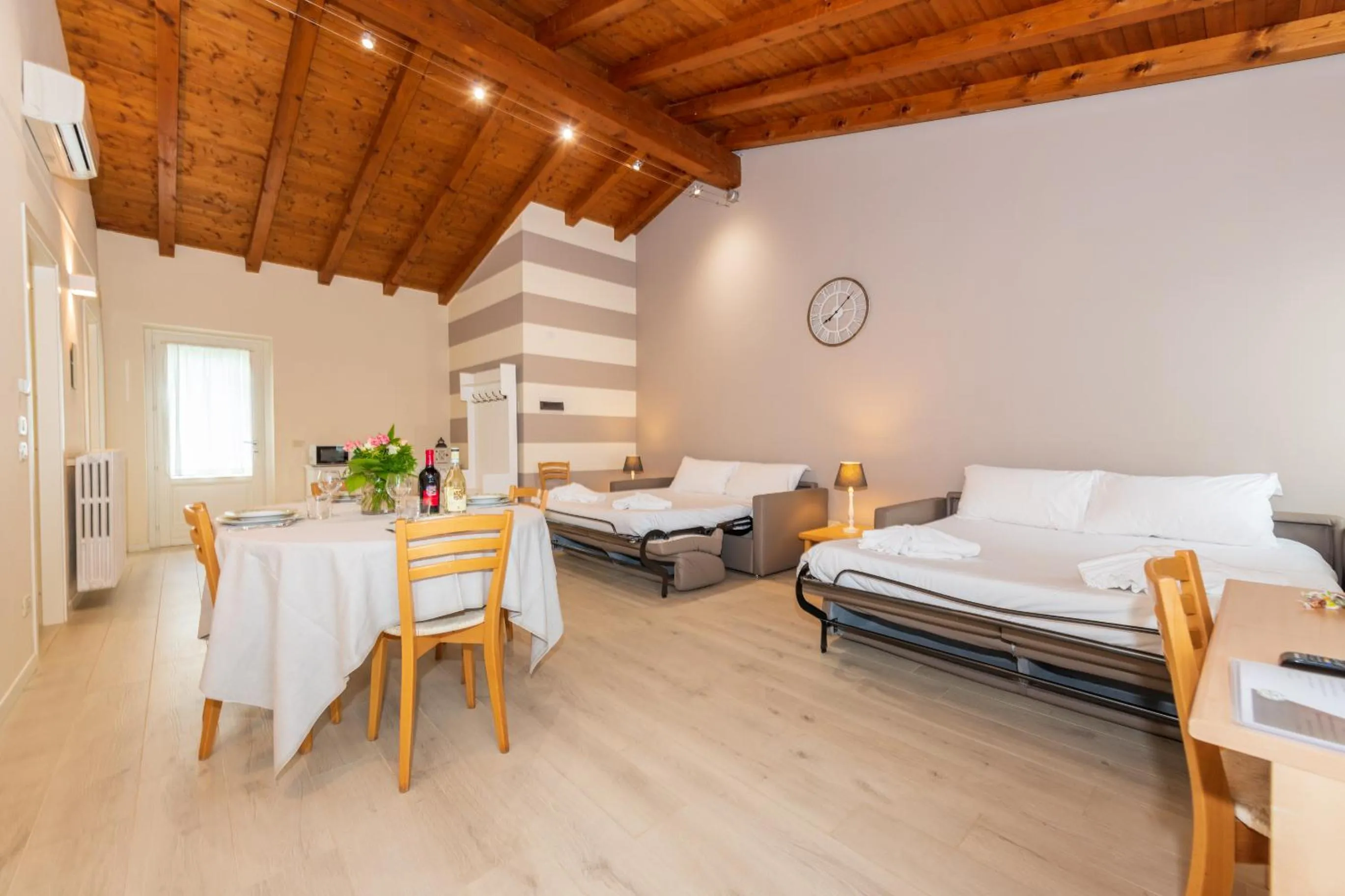 Living room, Bed in Bertoletta Village Apartments