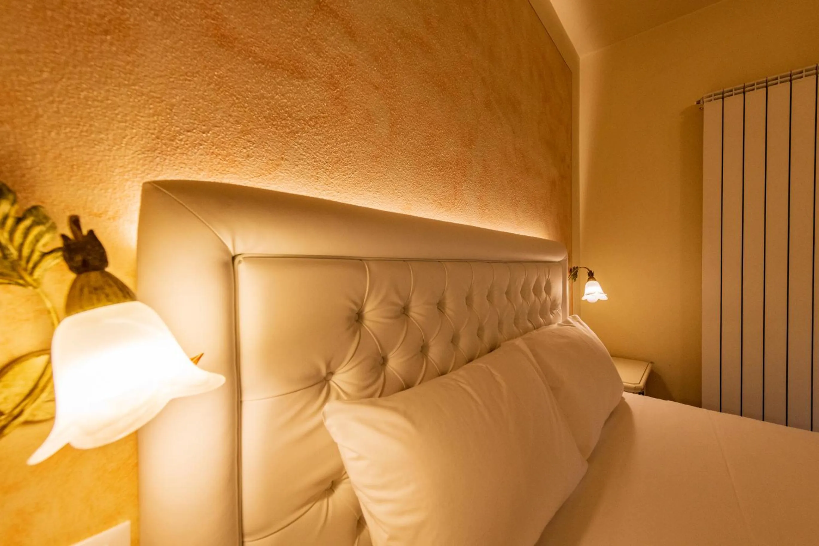 Bed in Bertoletta Village Apartments