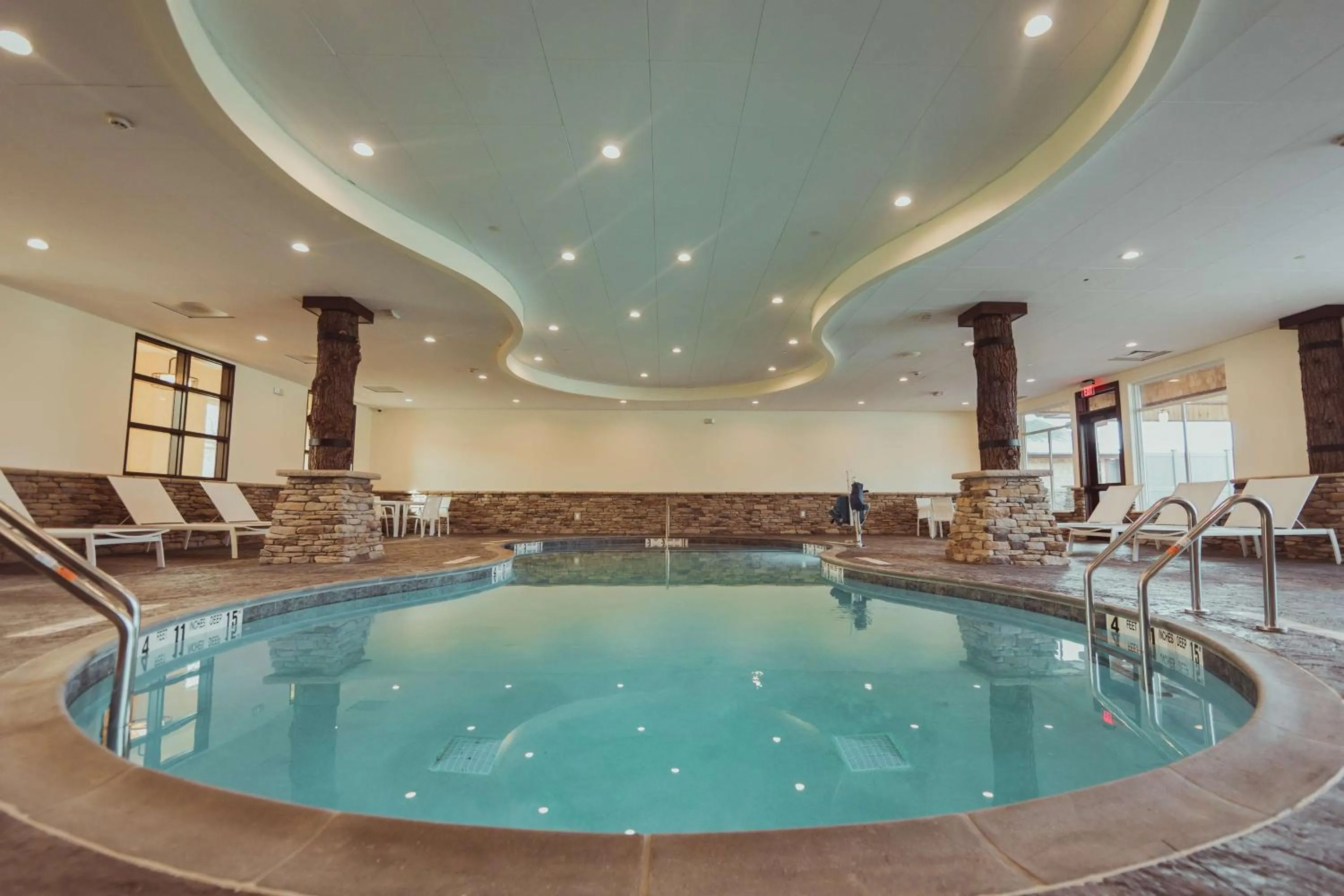 Pool view in Tailwater Lodge Altmar, Tapestry Collection By Hilton