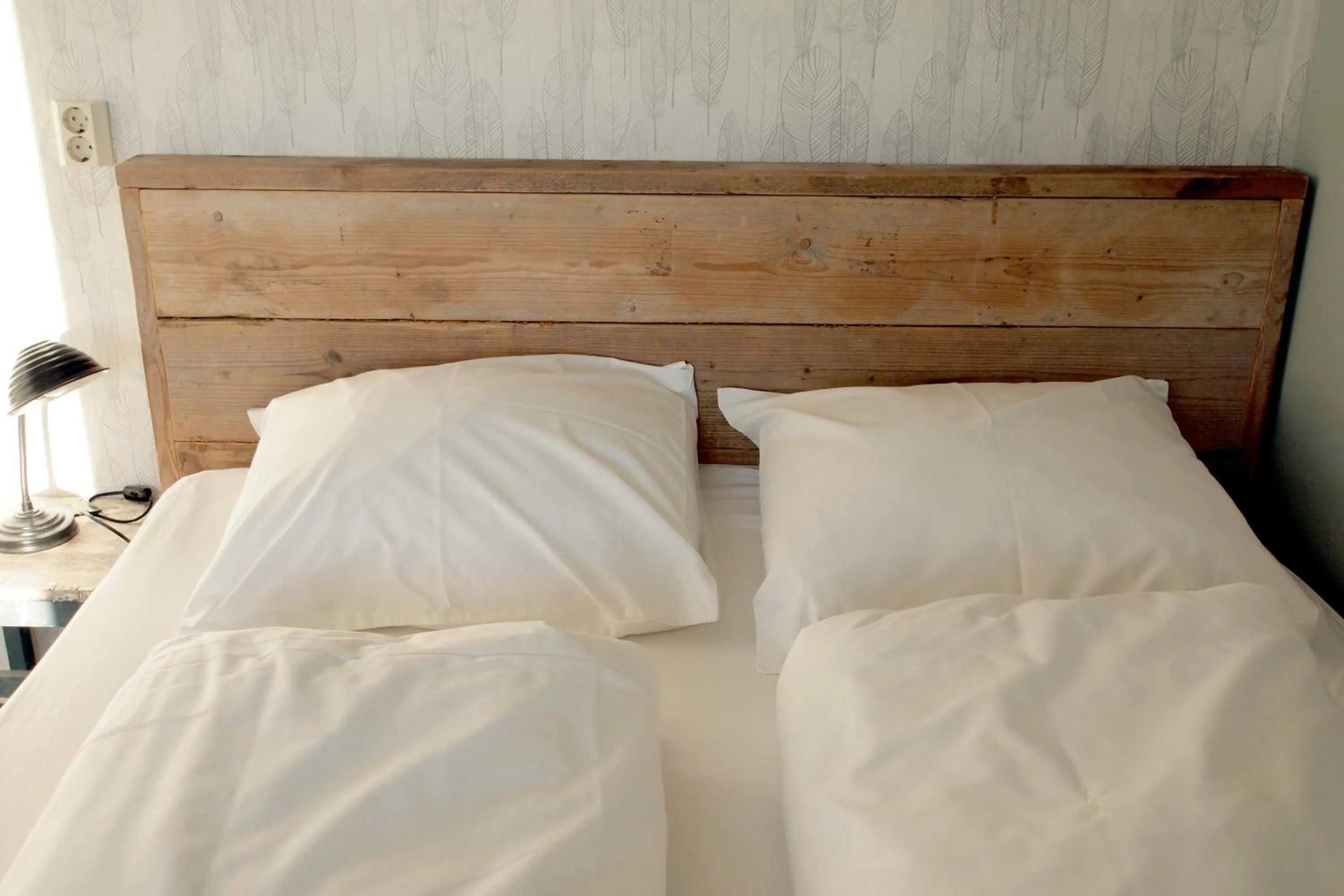 Bed in Amsterdam Farm Lodge