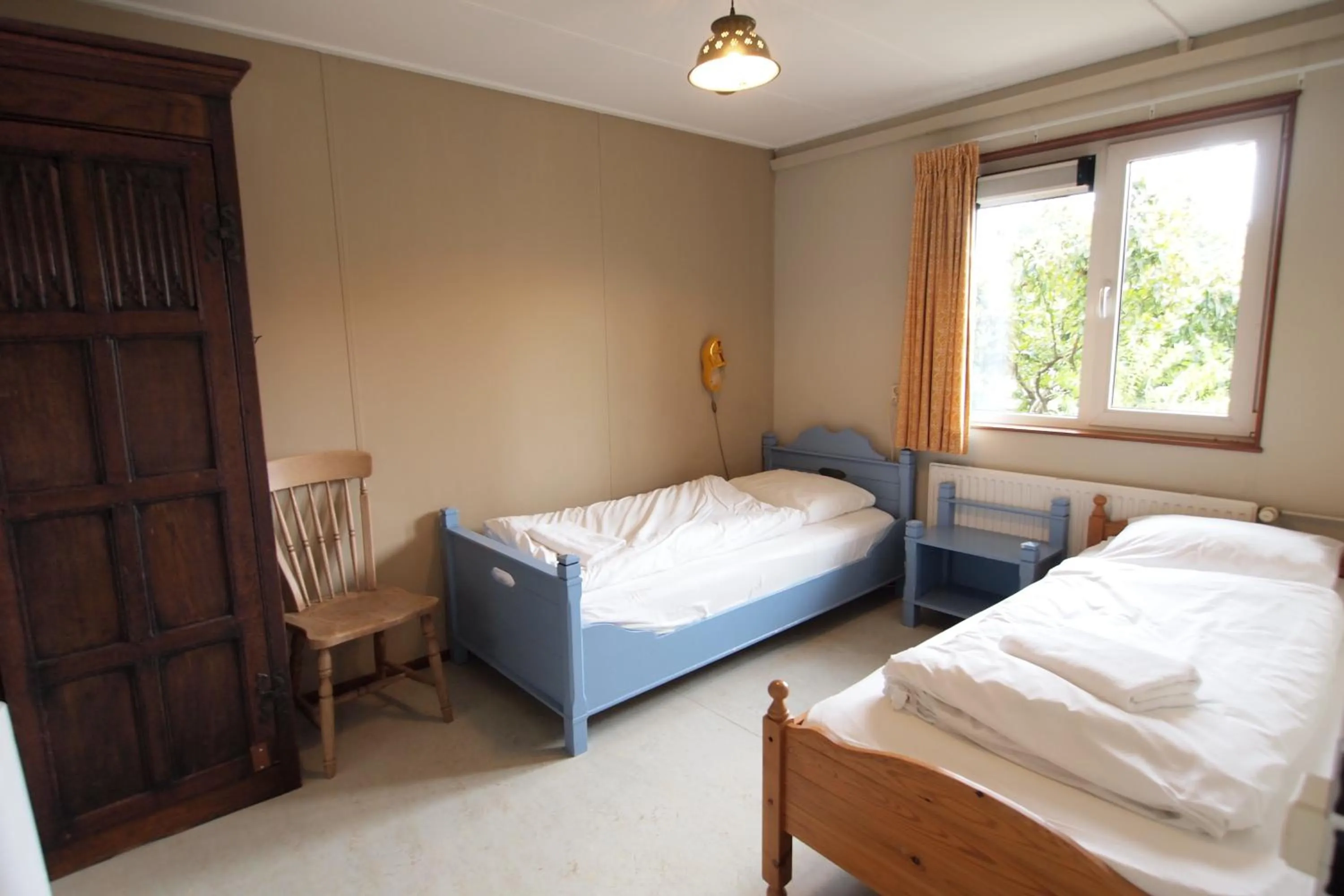 Bed in Amsterdam Farm Lodge