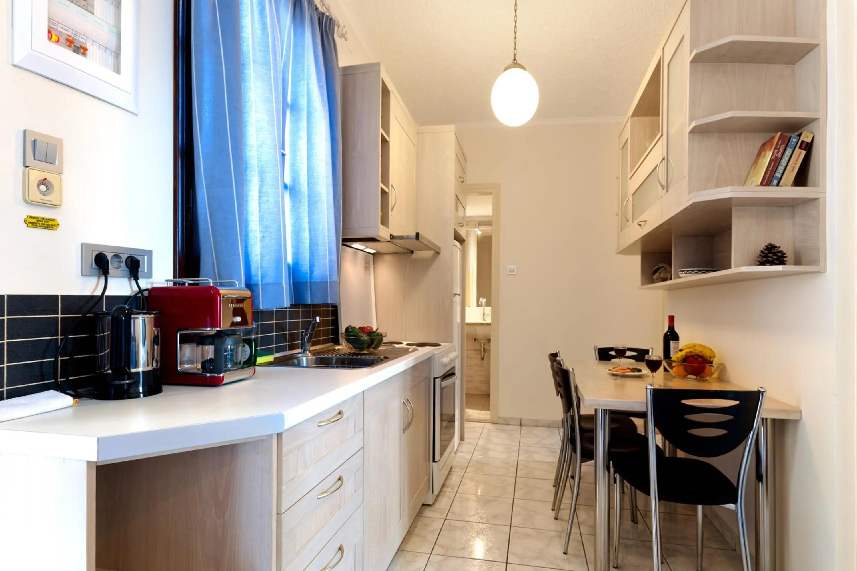 Kitchen or kitchenette in Giorgi's Blue Apartments