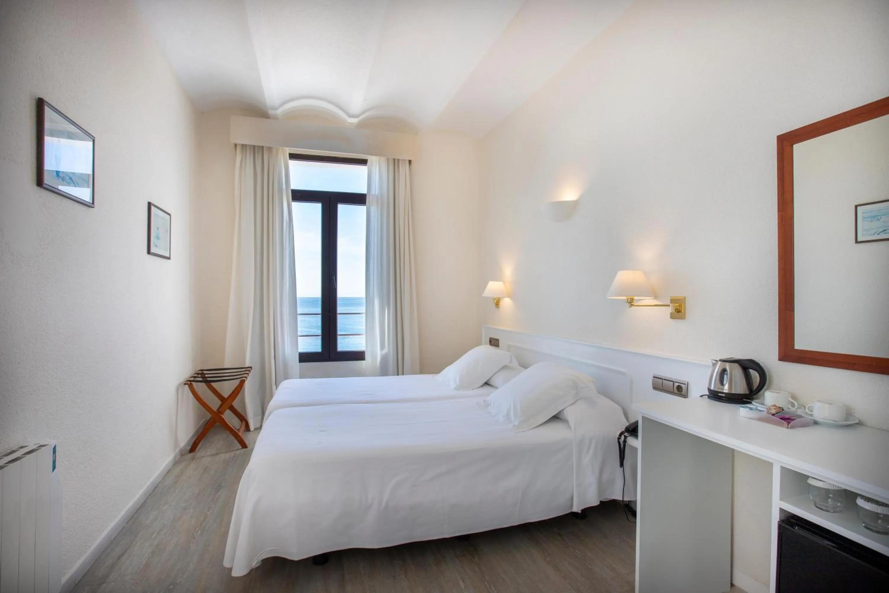 Bed in Hotel Llafranch