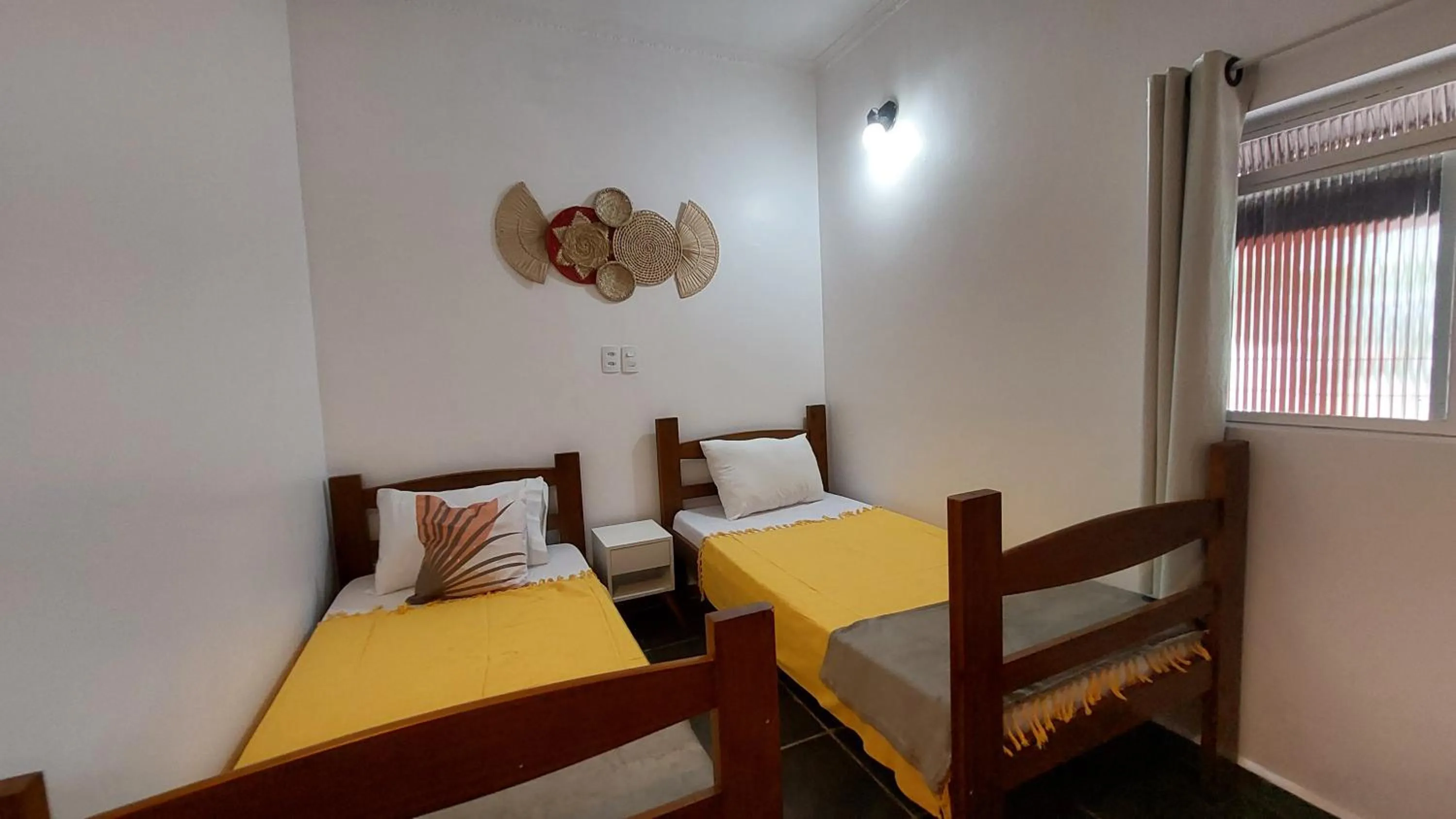 Bed in Pousada Sol do Araçá