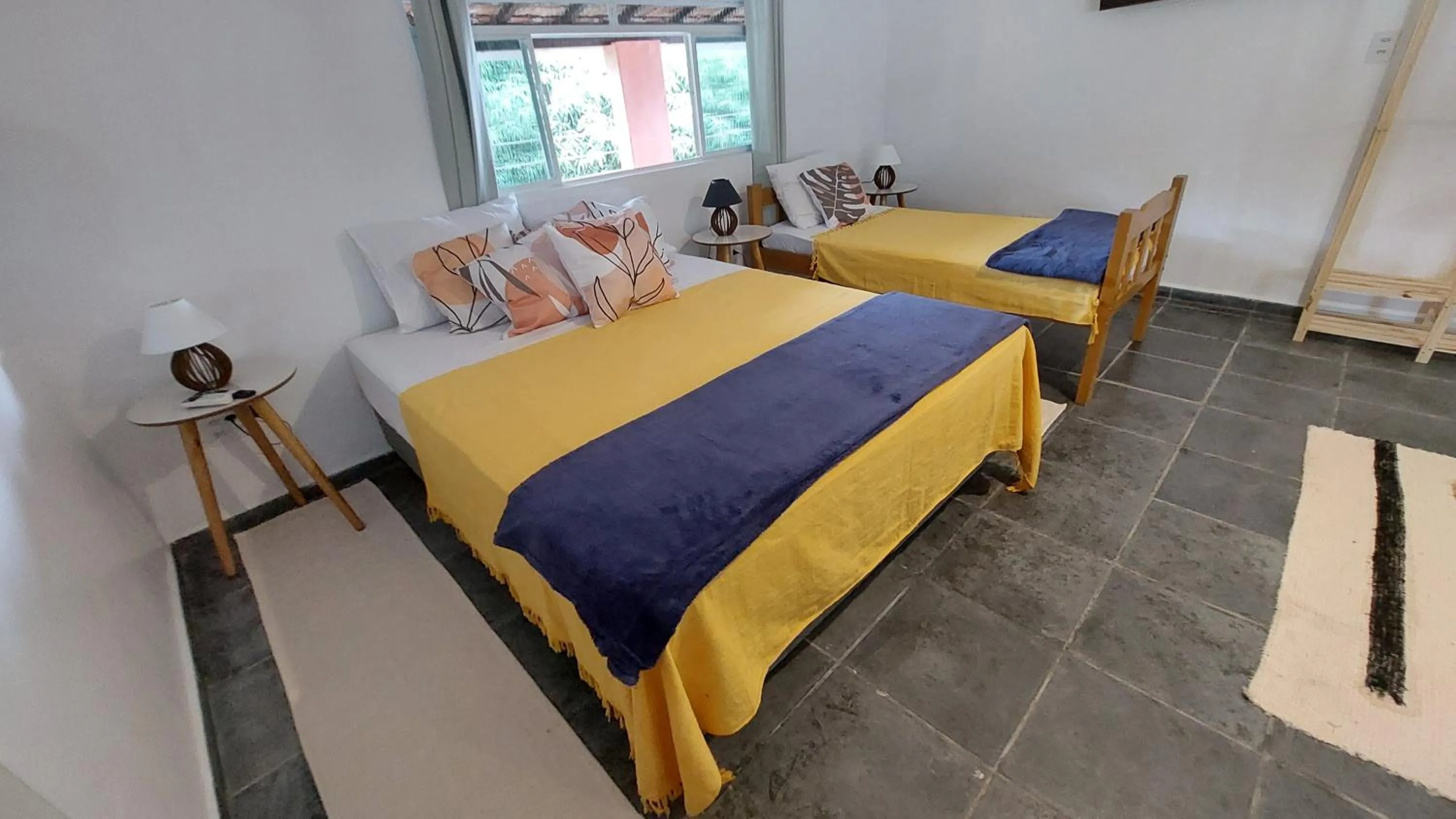 Bed in Pousada Sol do Araçá