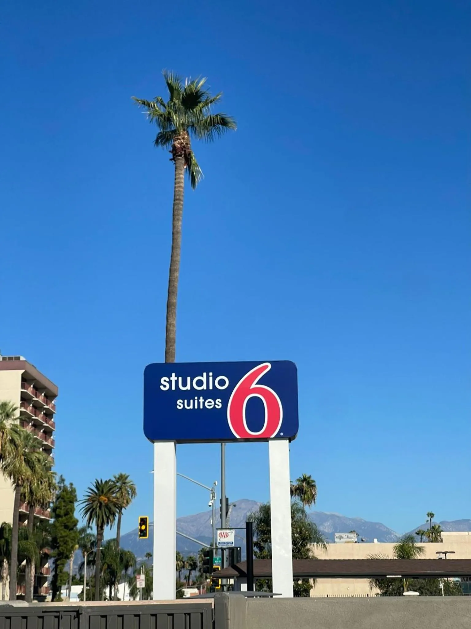 Property logo or sign in Studio 6 Suites San Bernardino, CA