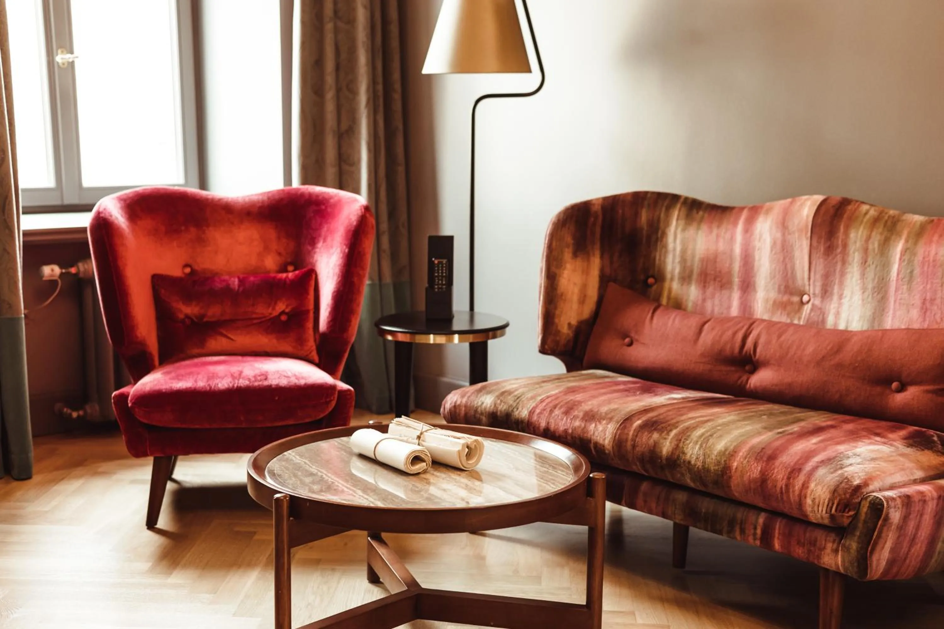 Living room in Grand Poet Hotel and SPA by Semarah