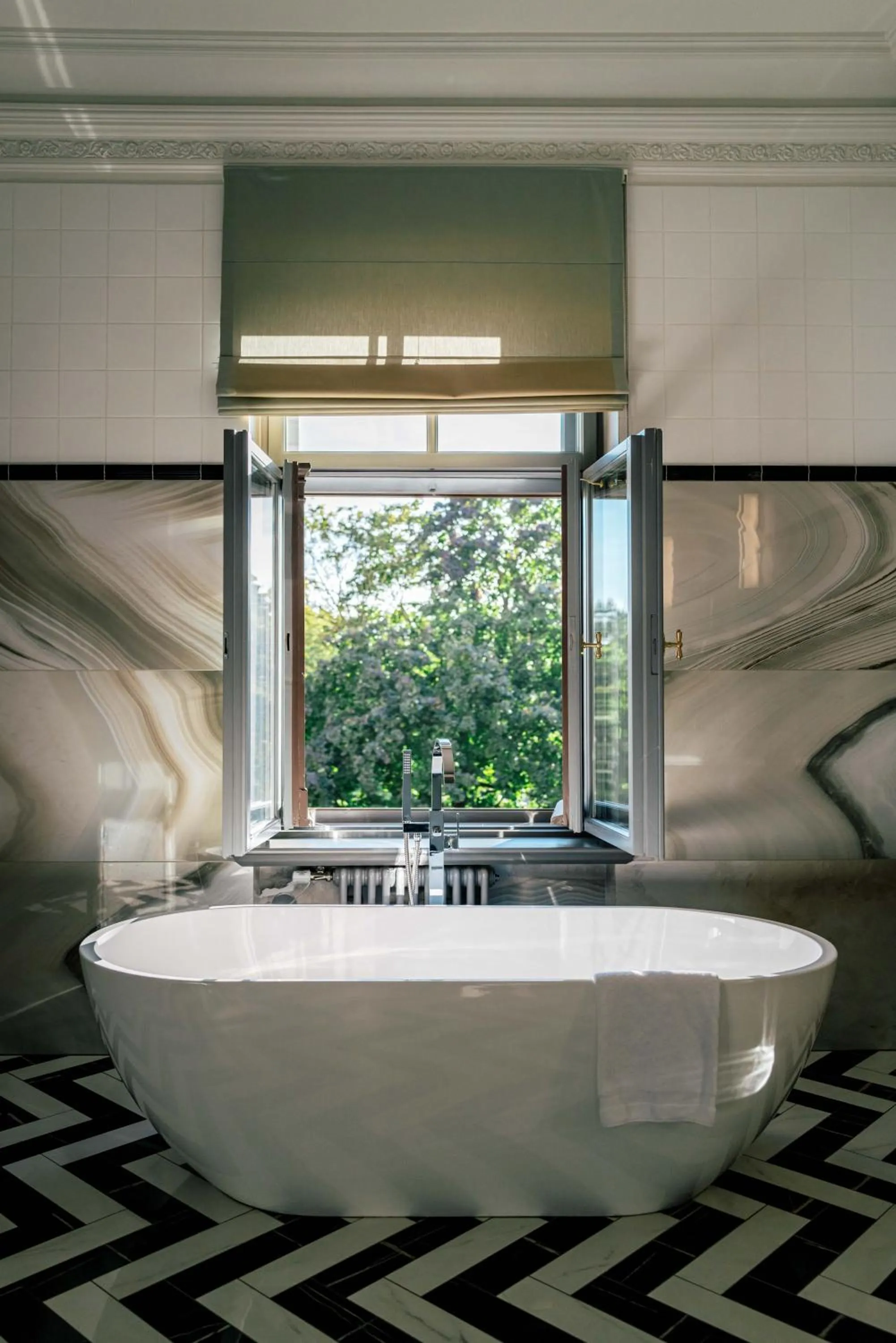 Bathroom in Grand Poet Hotel and SPA by Semarah