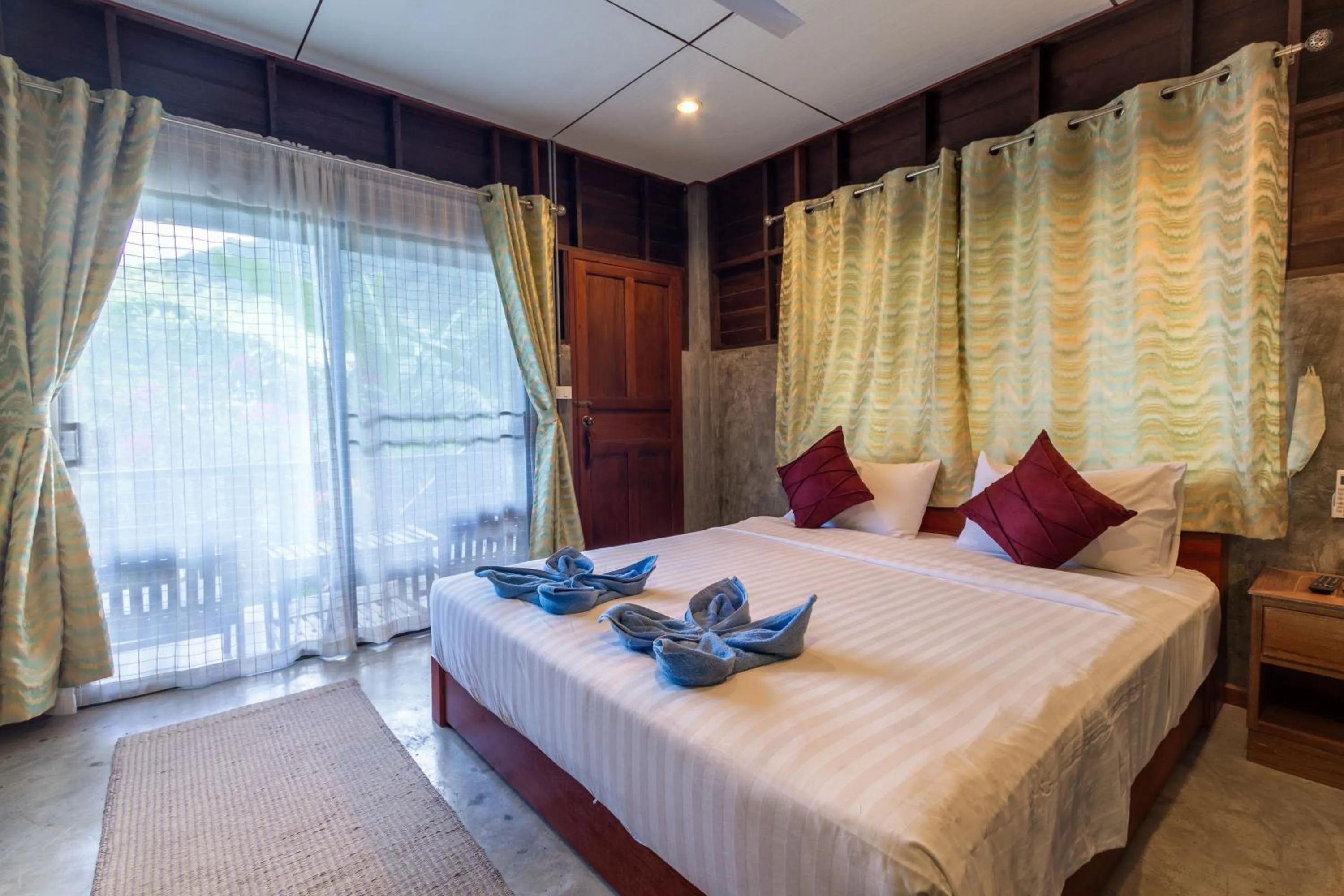 Bed in Kanya Cozy Bungalows Kata