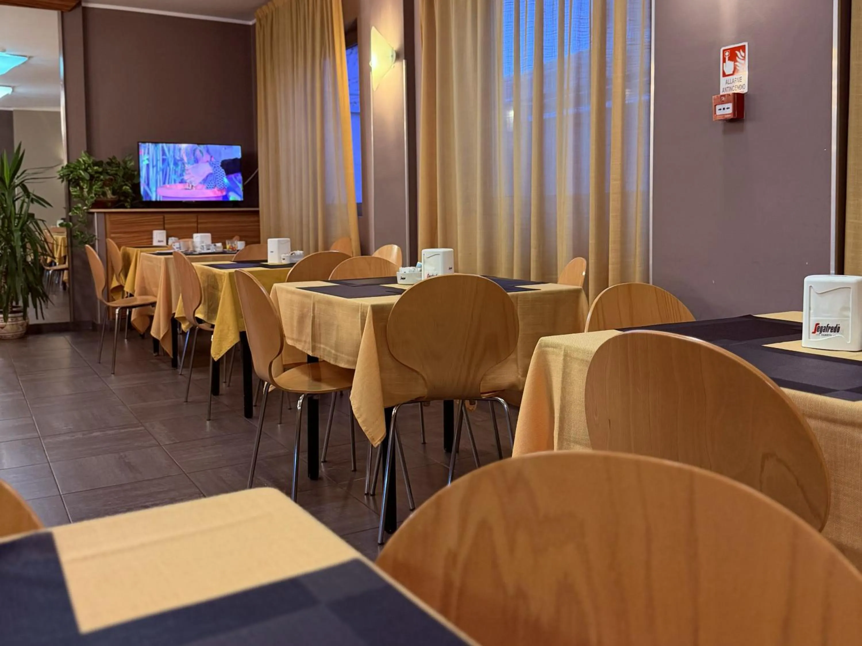 Communal lounge/ TV room in Hotel Giada