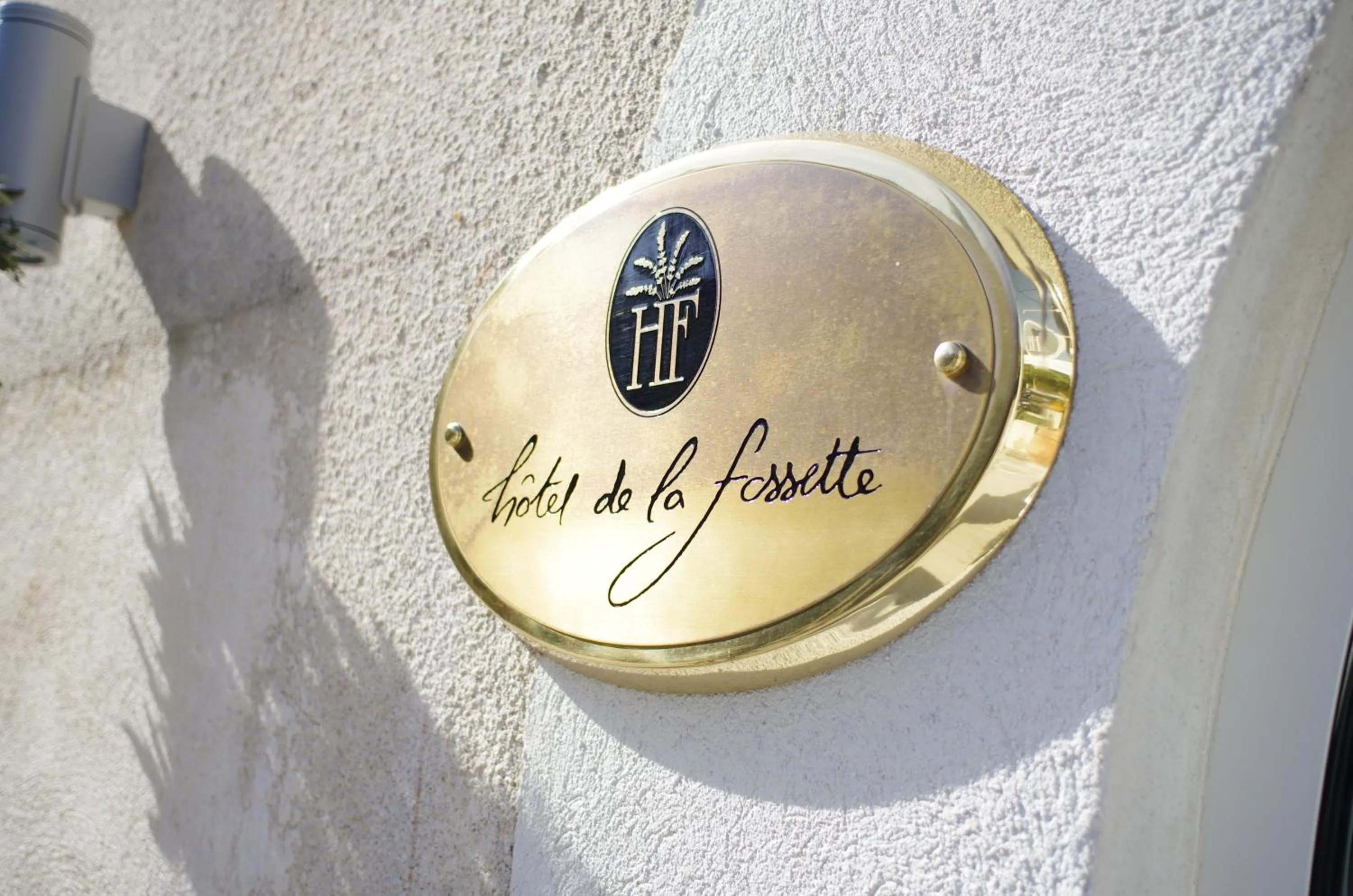Property logo or sign in Hôtel de La Fossette