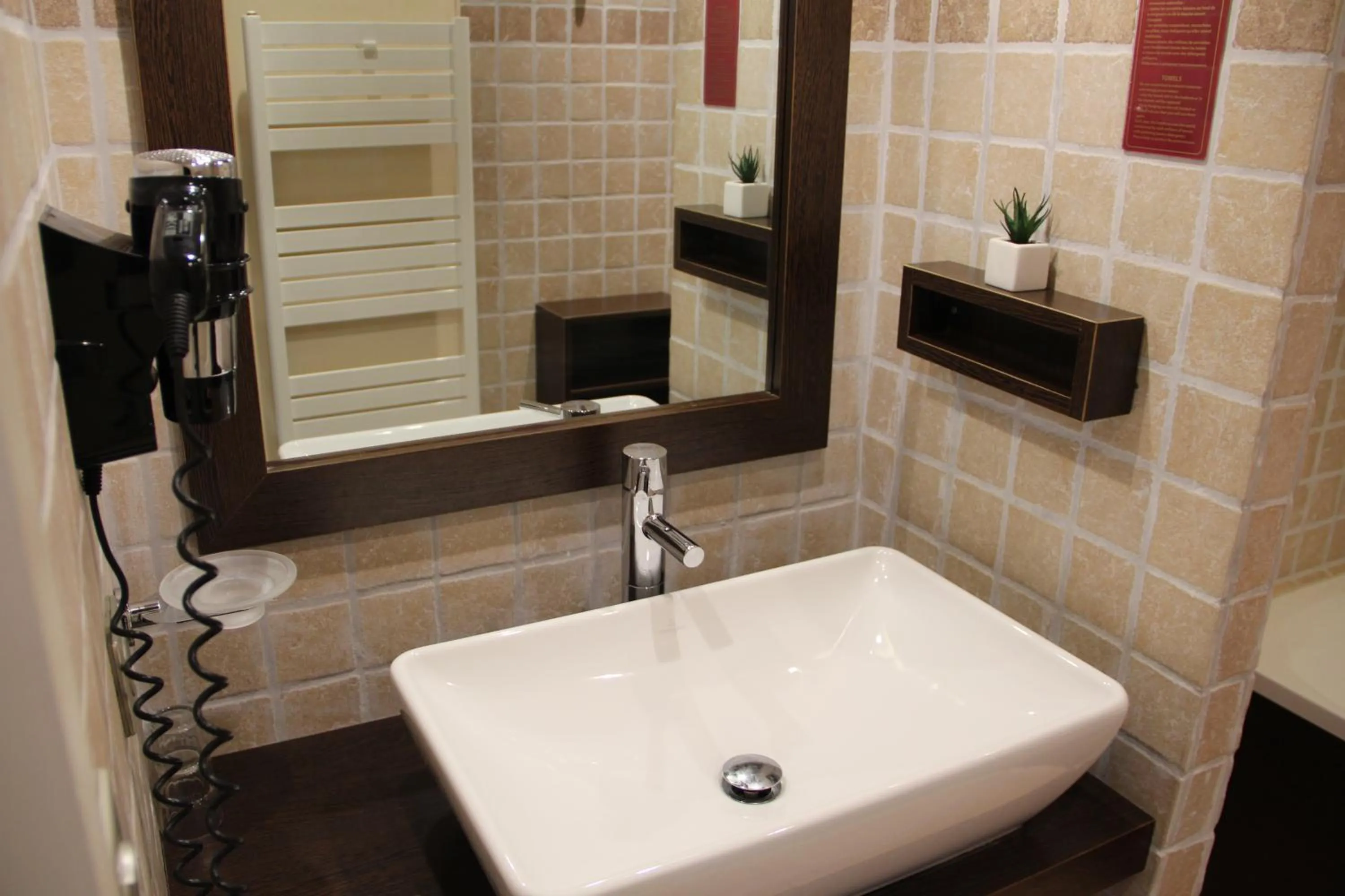 Bathroom in Hôtel de La Fossette