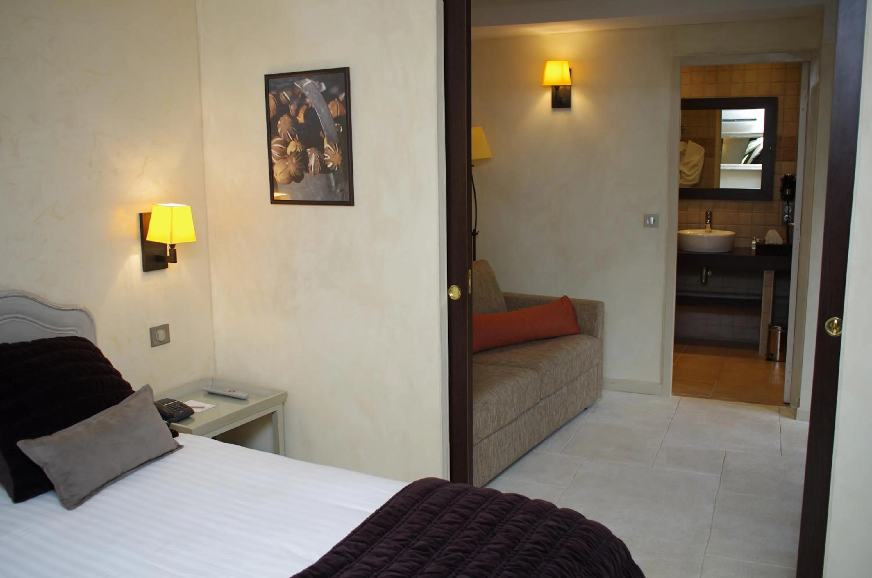 Bed in Hôtel de La Fossette