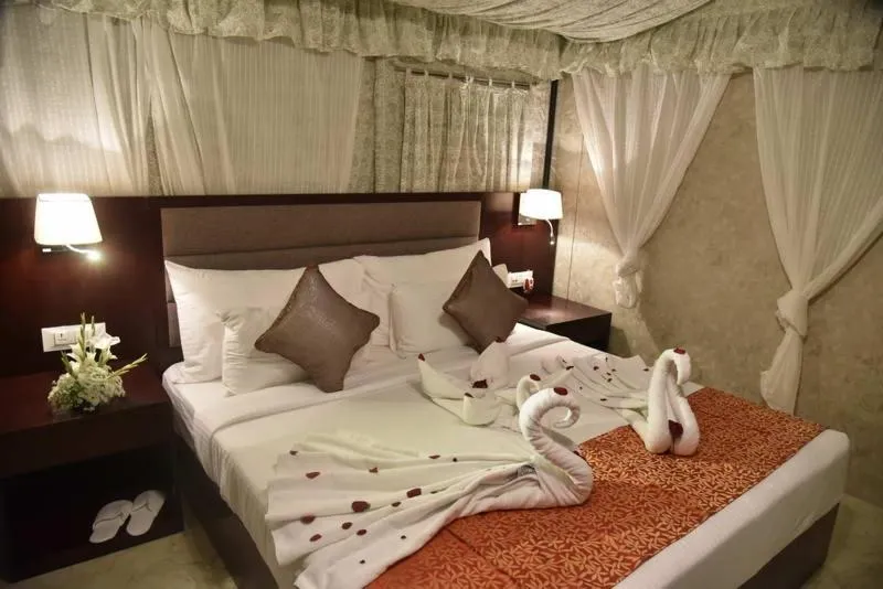 Staff, Bed in Pride Hotel & Convention Centre Indore