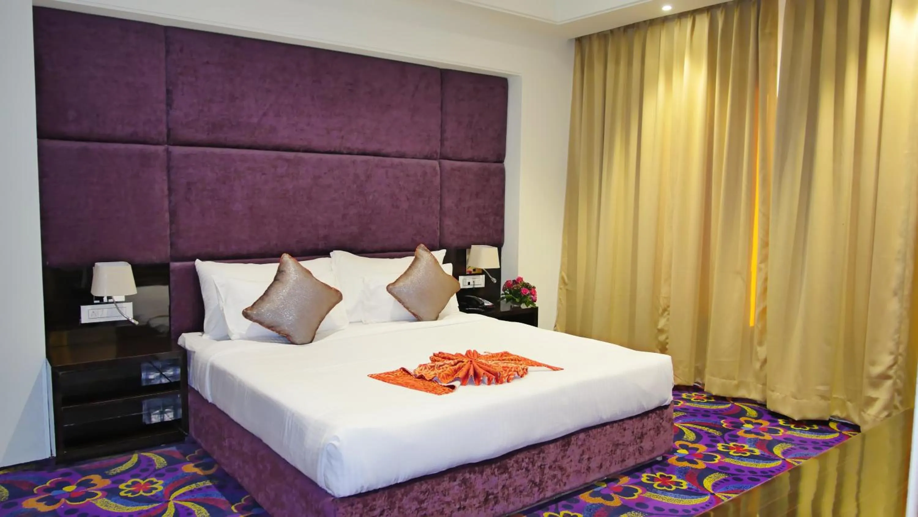 Bed in Pride Hotel & Convention Centre Indore