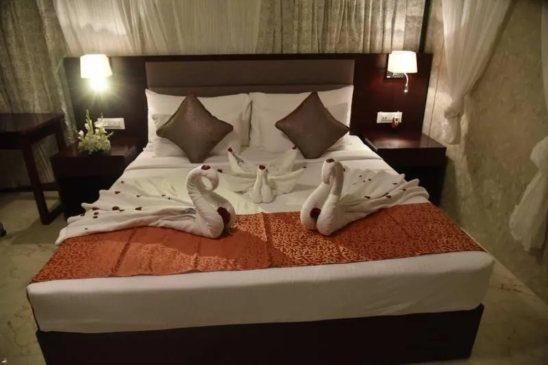 Bathroom, Bed in Pride Hotel & Convention Centre Indore