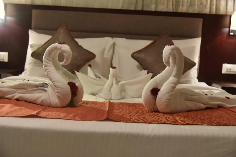 Staff, Bed in Pride Hotel & Convention Centre Indore