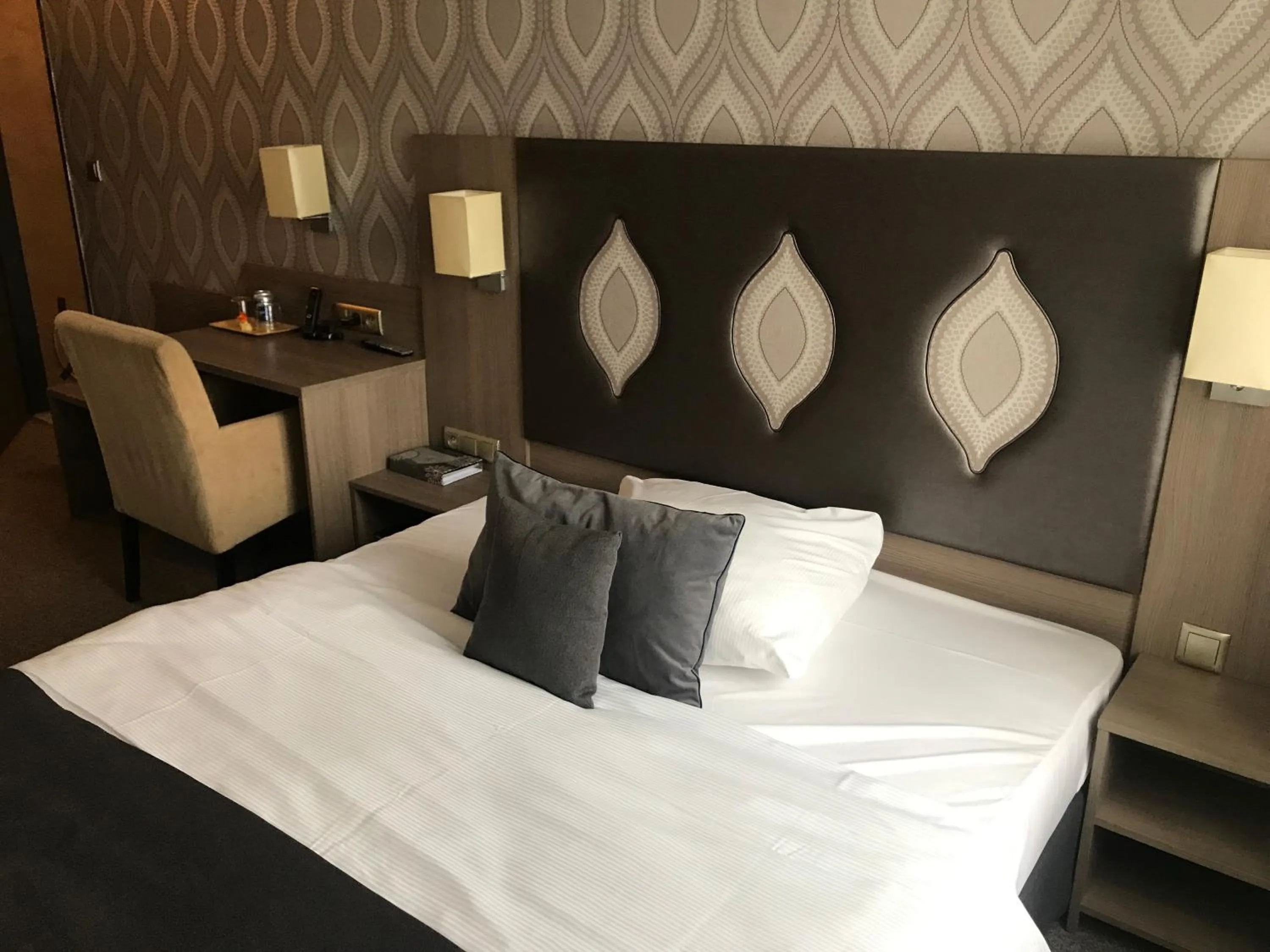 Bed in City Boutique Hotel