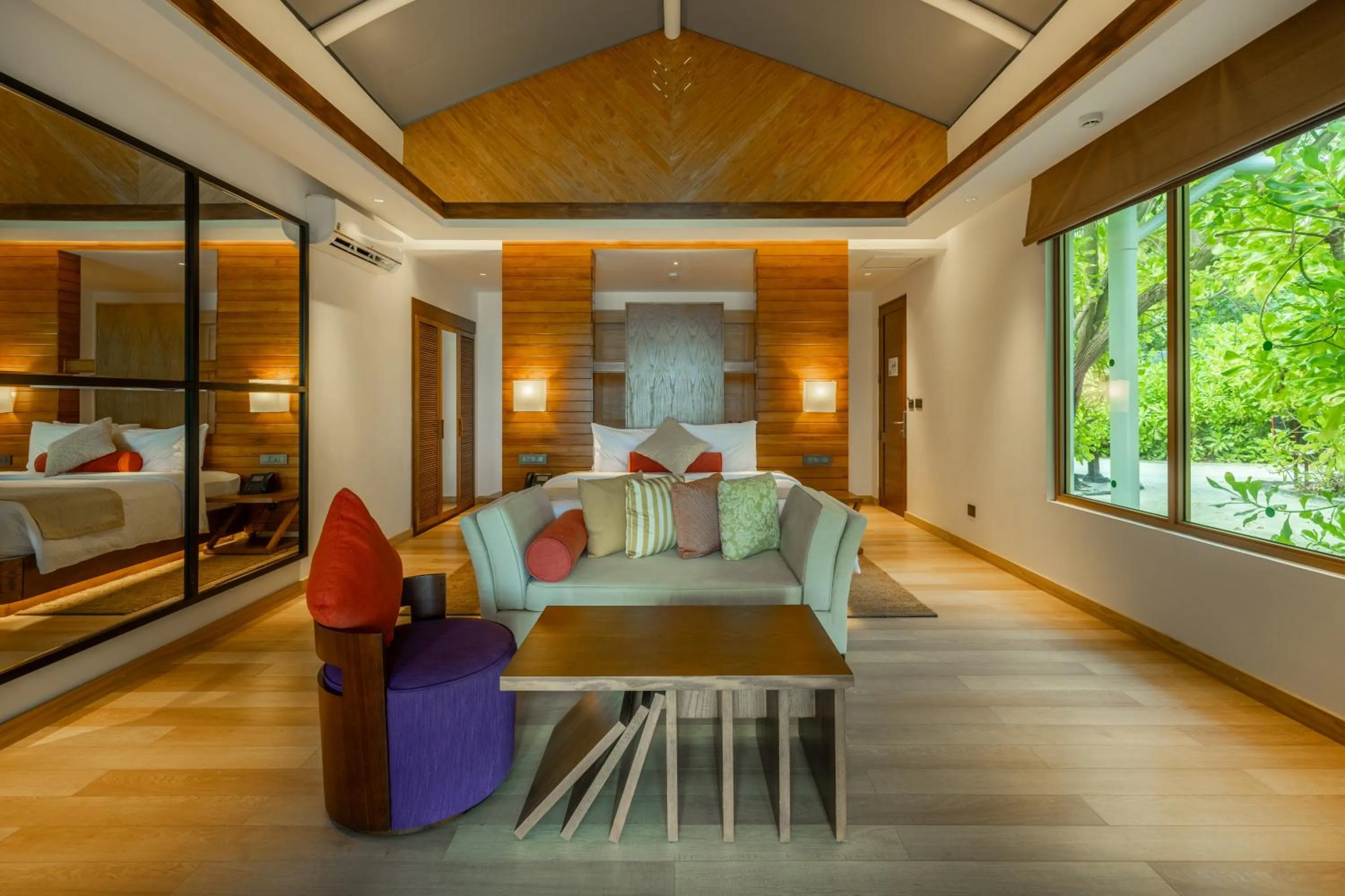Photo of the whole room, Bed in Cinnamon Hakuraa Huraa Maldives - All Inclusive Adults-Only Escape with One-way Free Speedboat