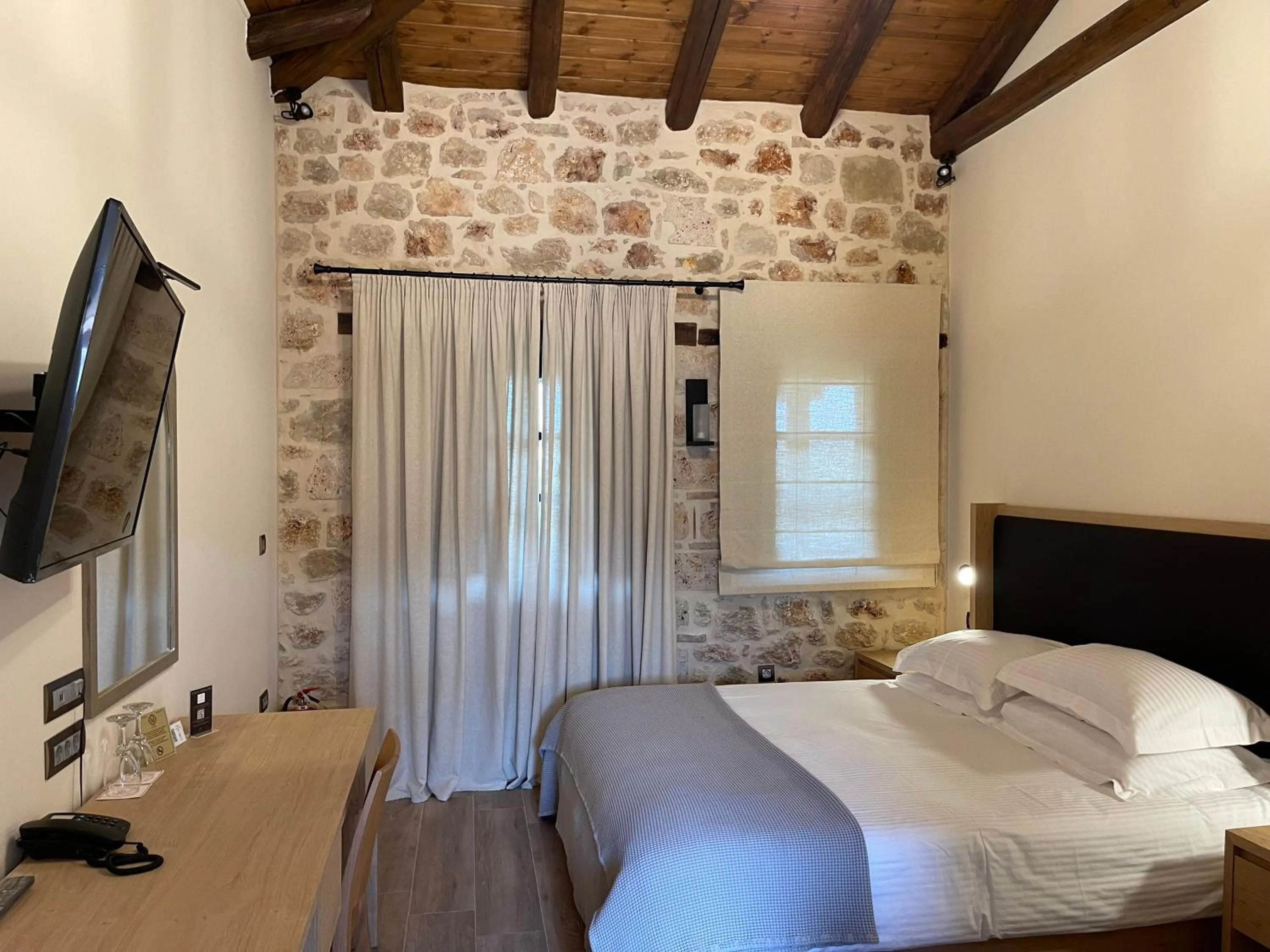 Bed in Mystras Grand Palace Resort & Spa