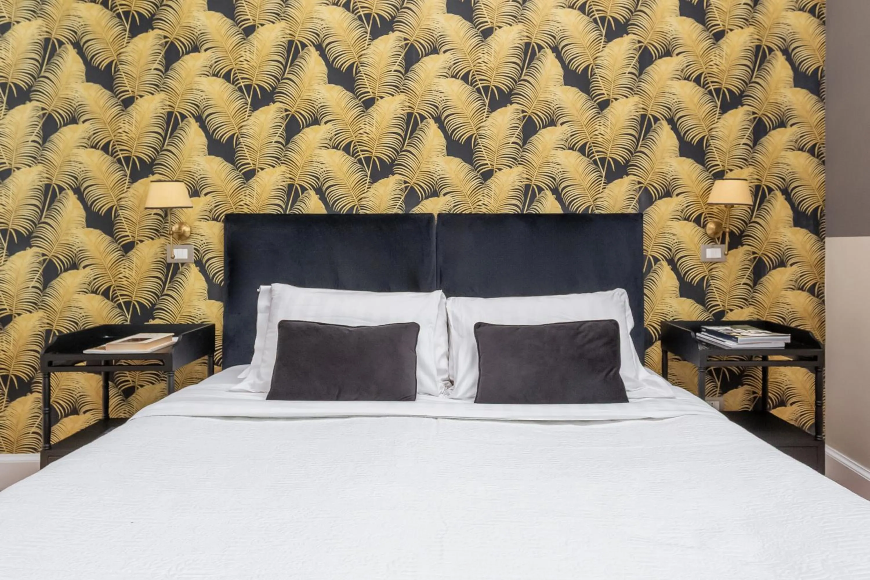 Bed in Hotel Parrasio