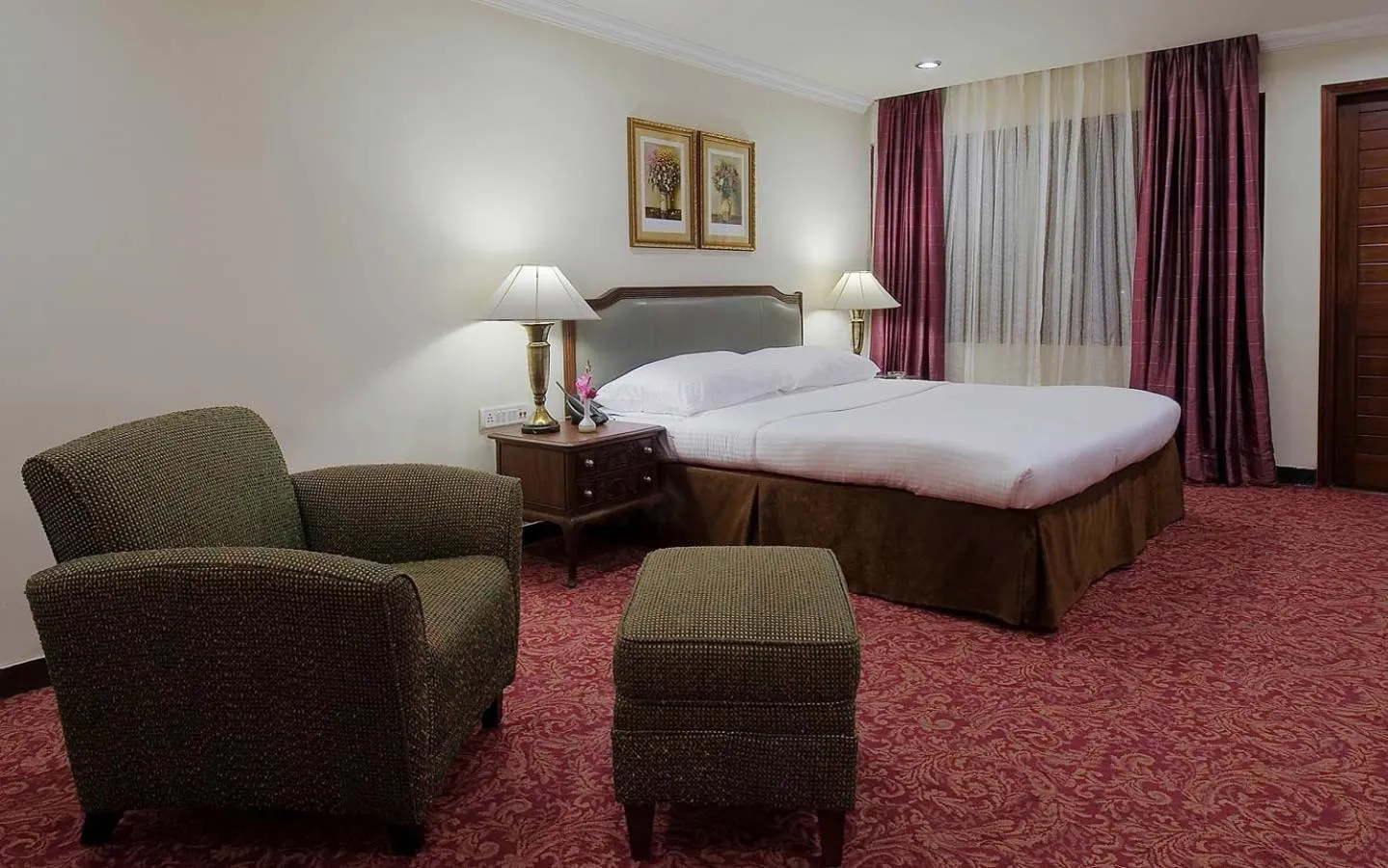 Photo of the whole room, Bed in Mayfair Rourkela