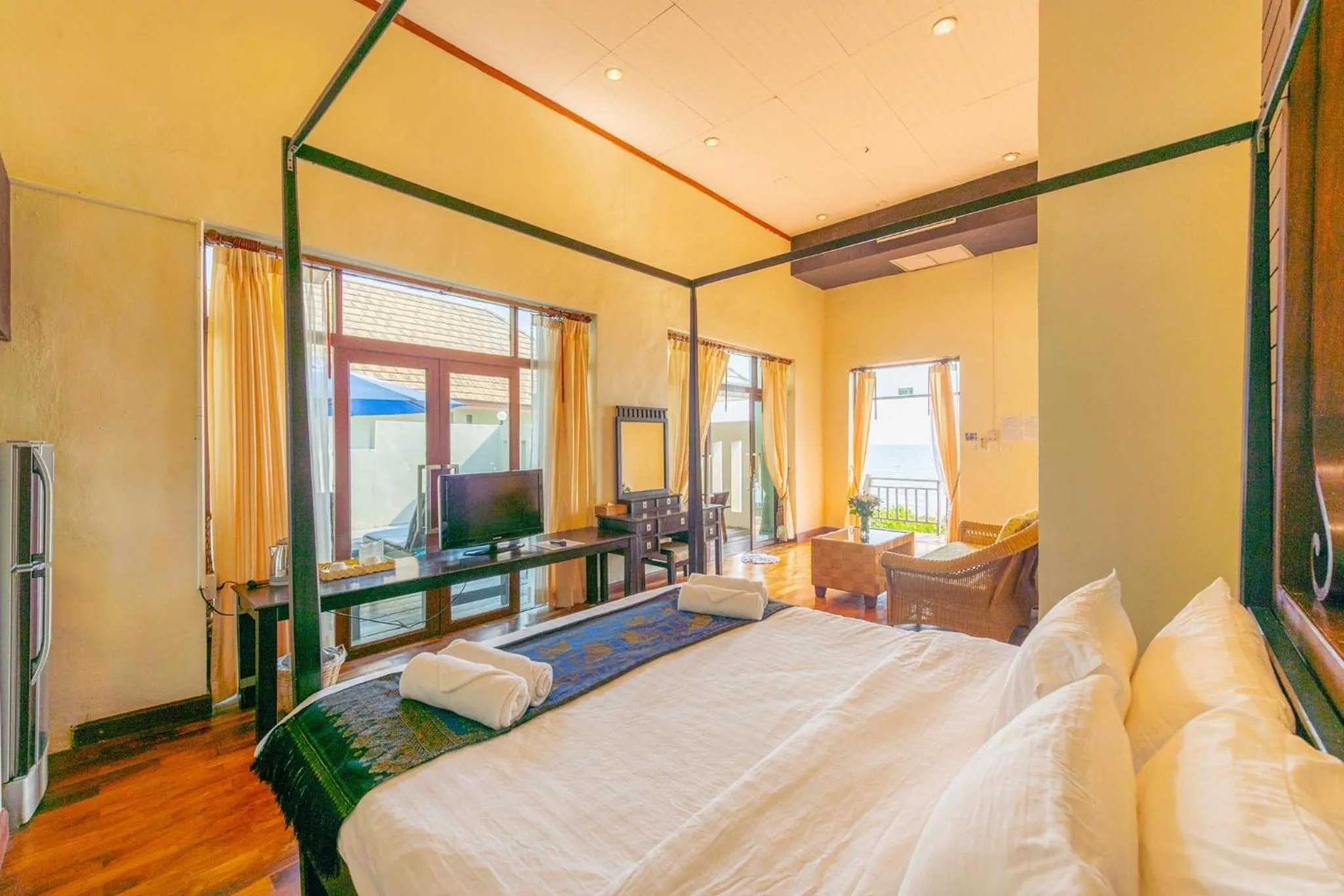 Bed in Siam Beach Resort