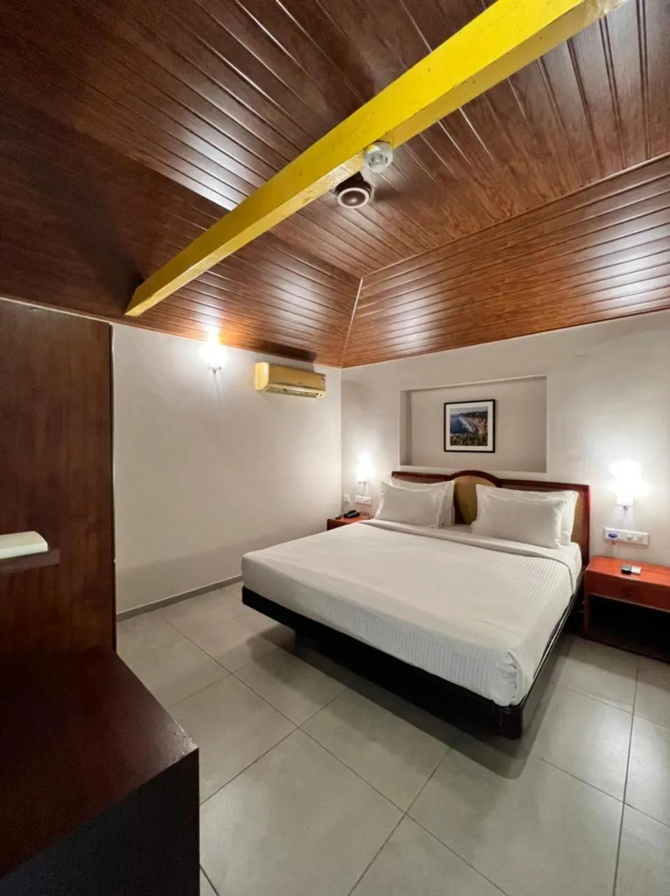 Bed in Abad Harmonia Ayurvedic Beach Resort