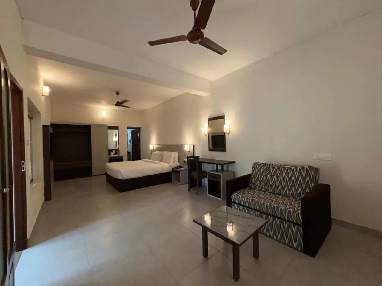 Bed in Abad Harmonia Ayurvedic Beach Resort