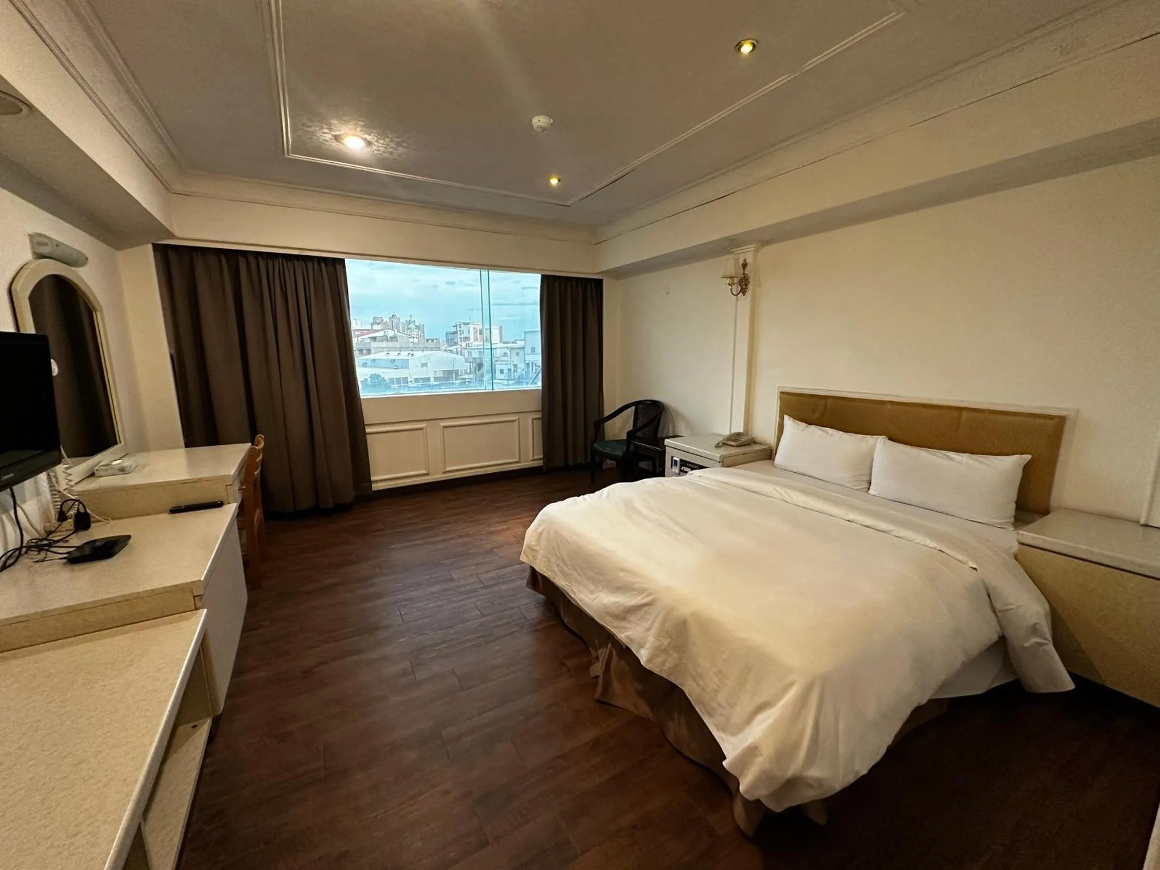 Bedroom in 東陽峇里商旅酒店