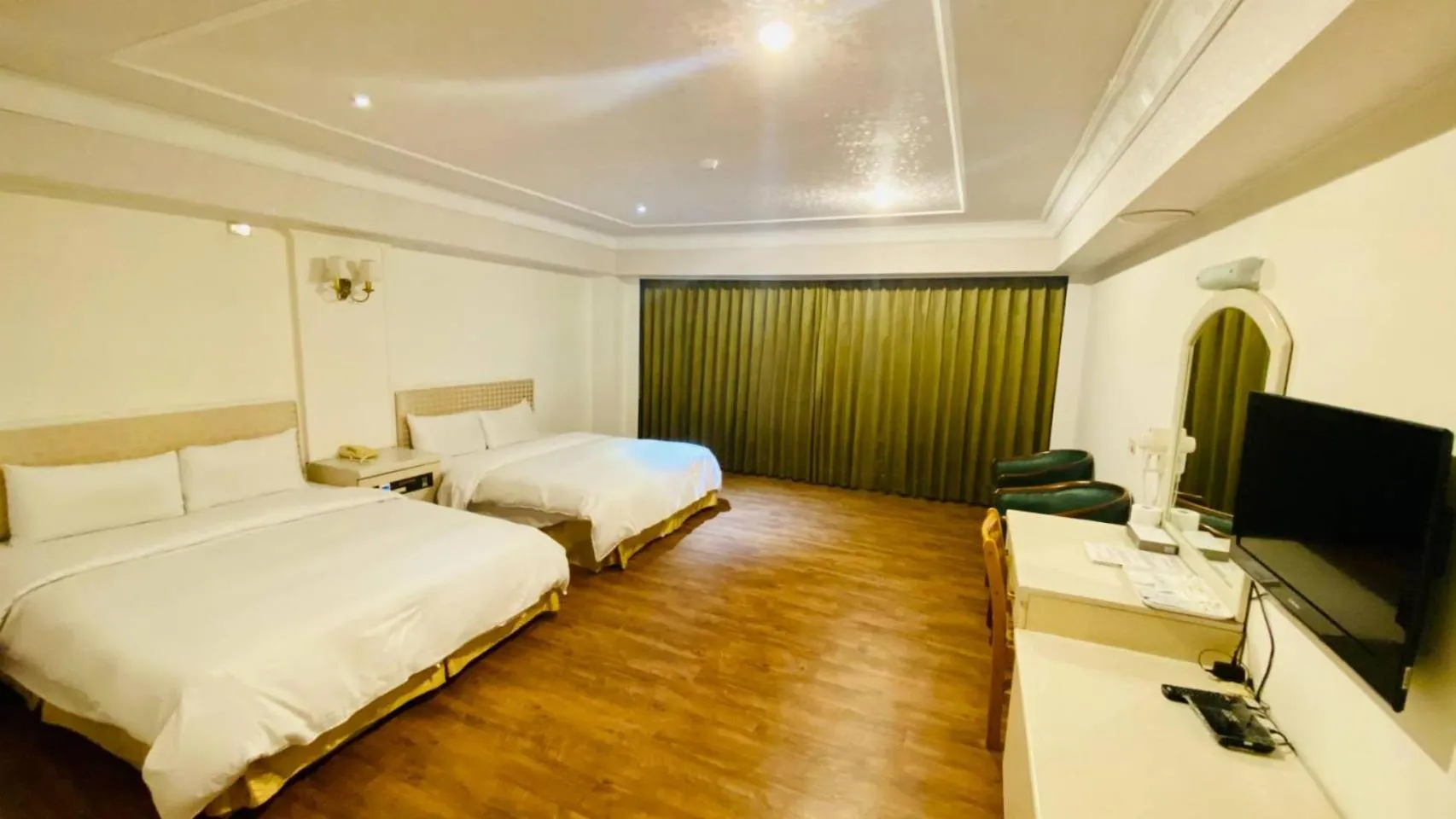 Bedroom in 東陽峇里商旅酒店